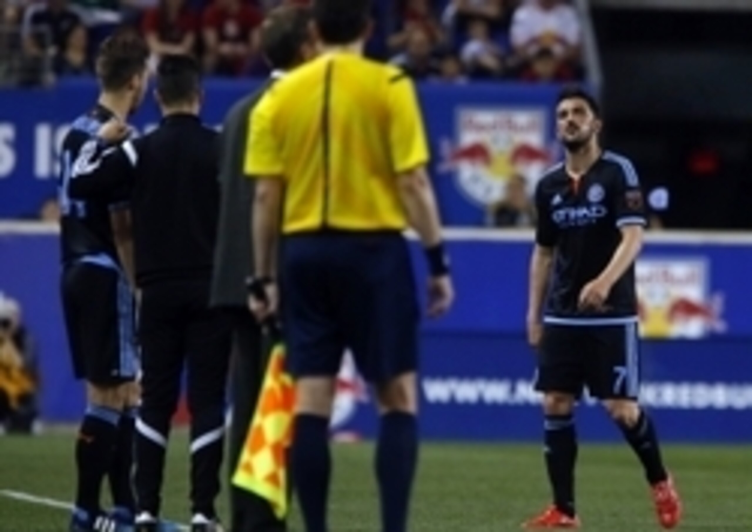 David Villa disappointedly makes way for Patrick Mullins.