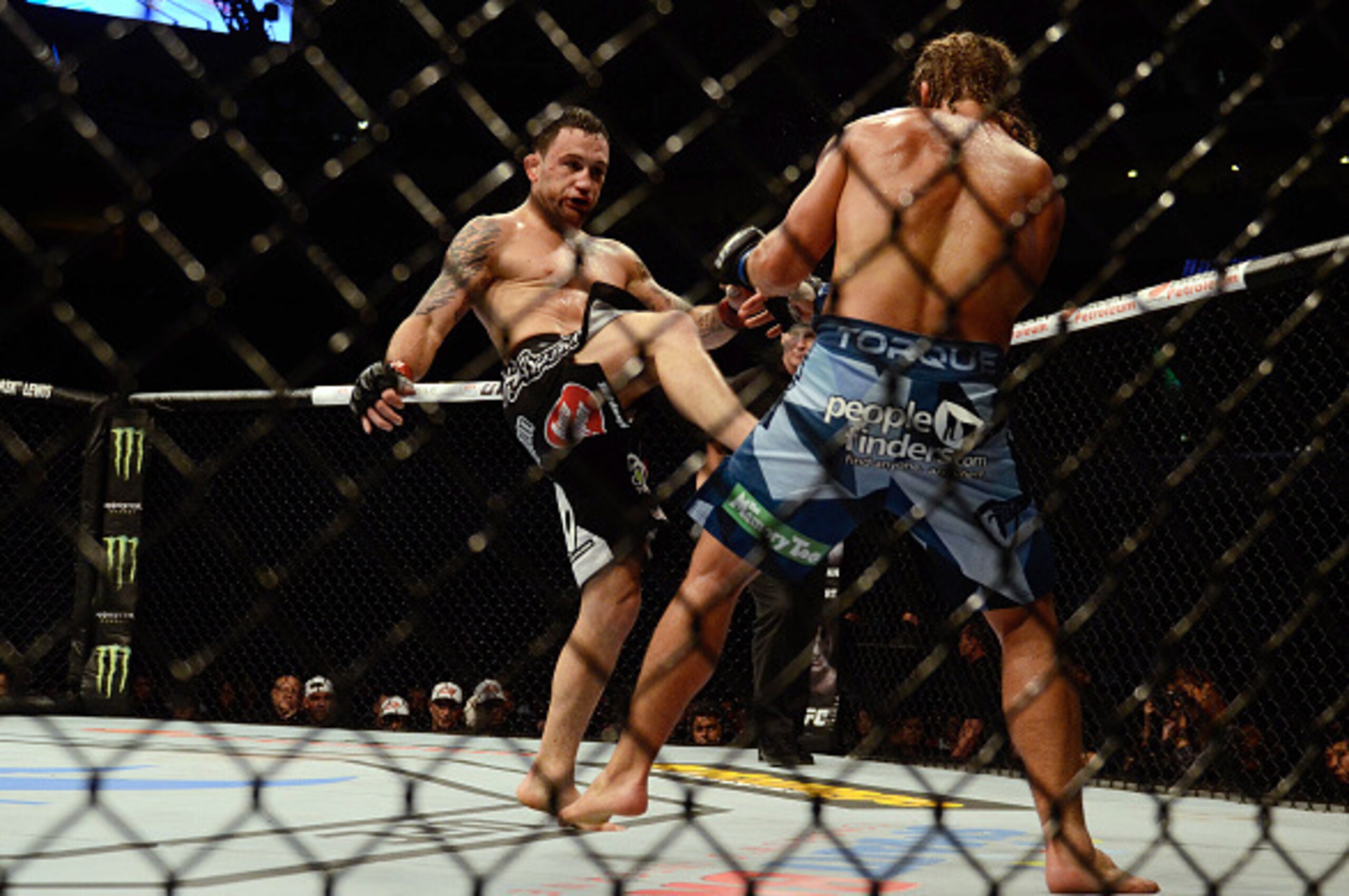 Frankie Edgar (left) fought Urijah Faber (right) at UFC Fight Night 66 in the Philippines.