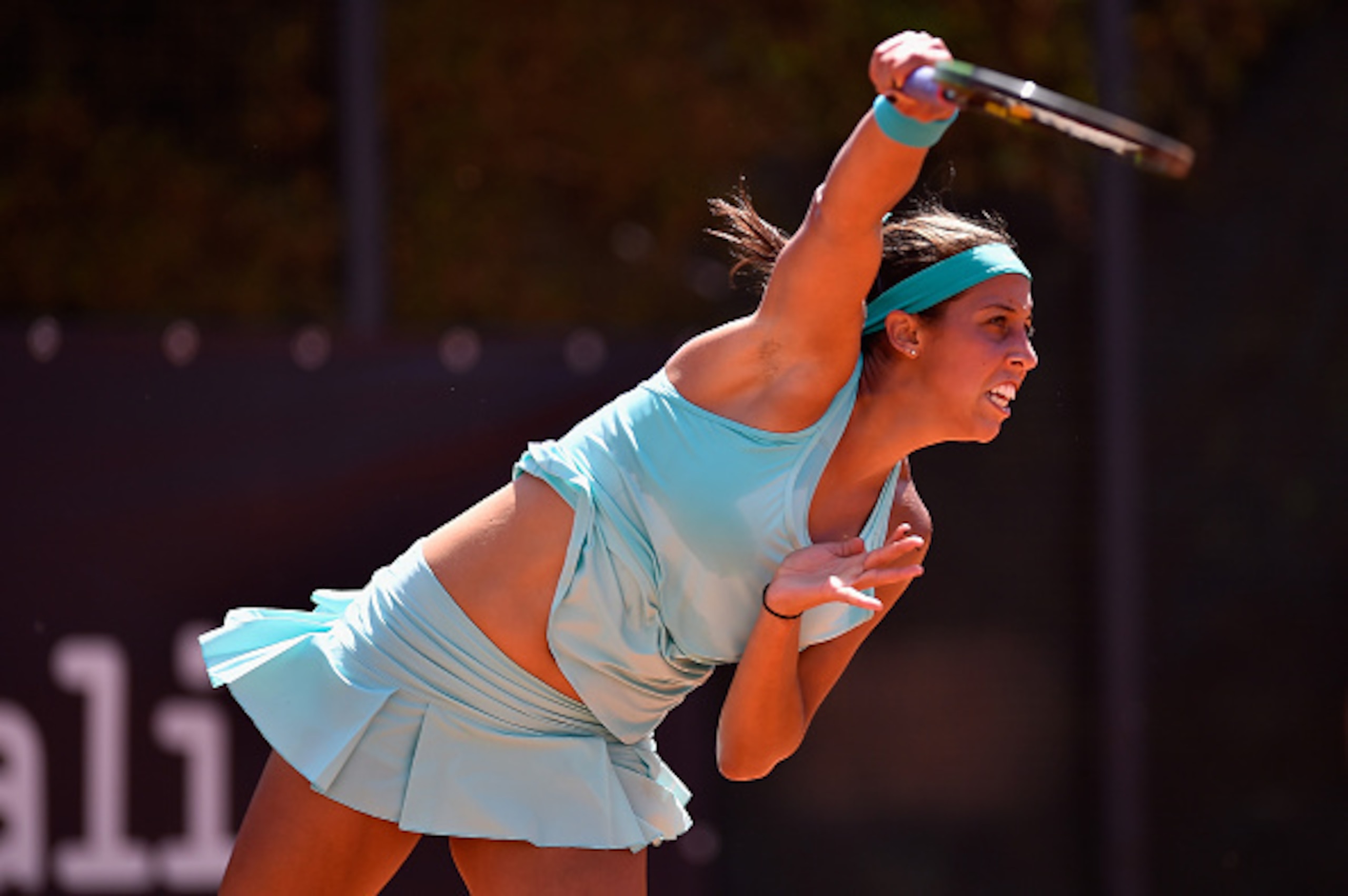 Madison Keys hits a serve during at match at the 2015 Italian Open.