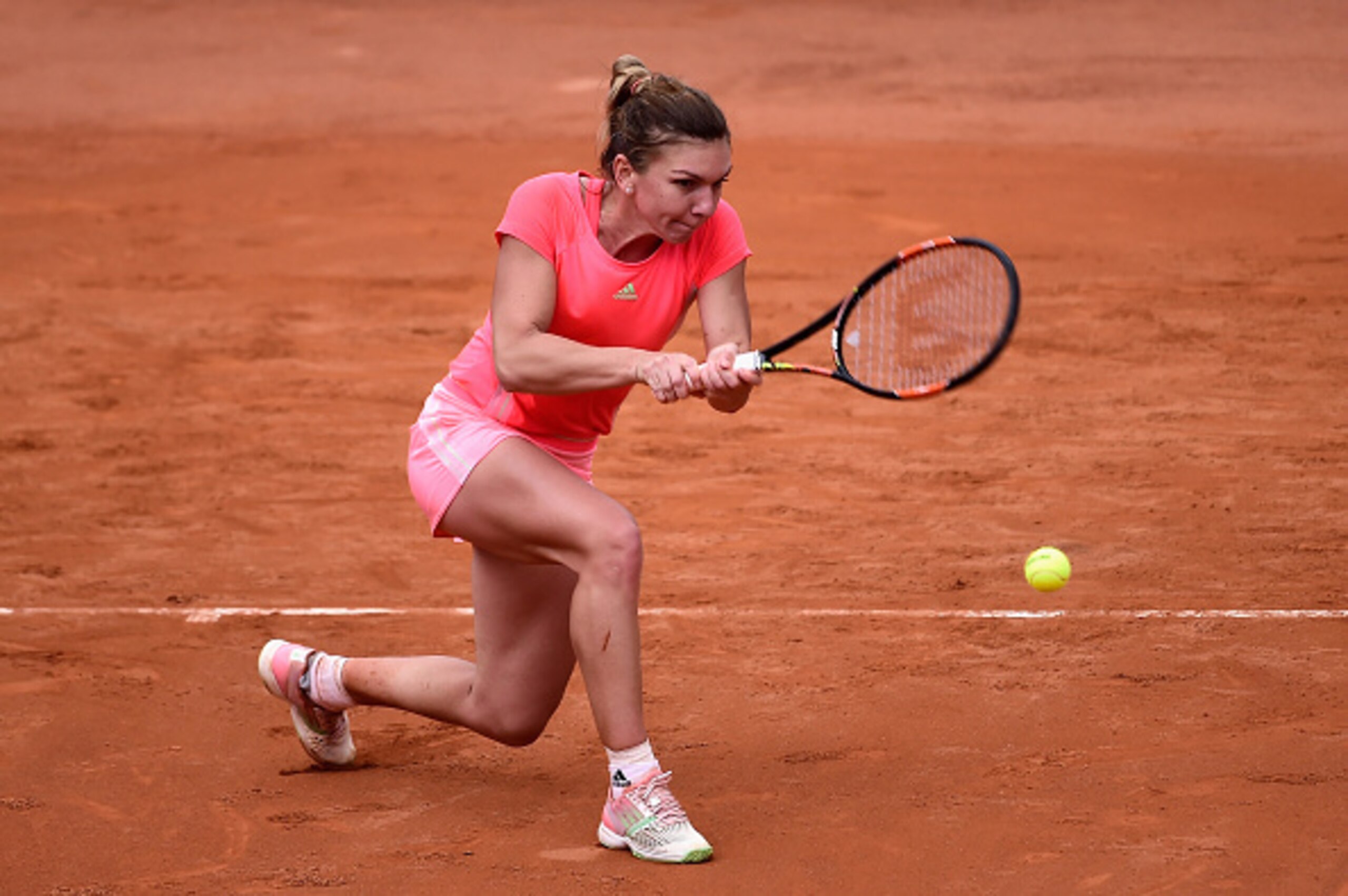 Simona Halep hits a backhand during a match at the Italian Open.