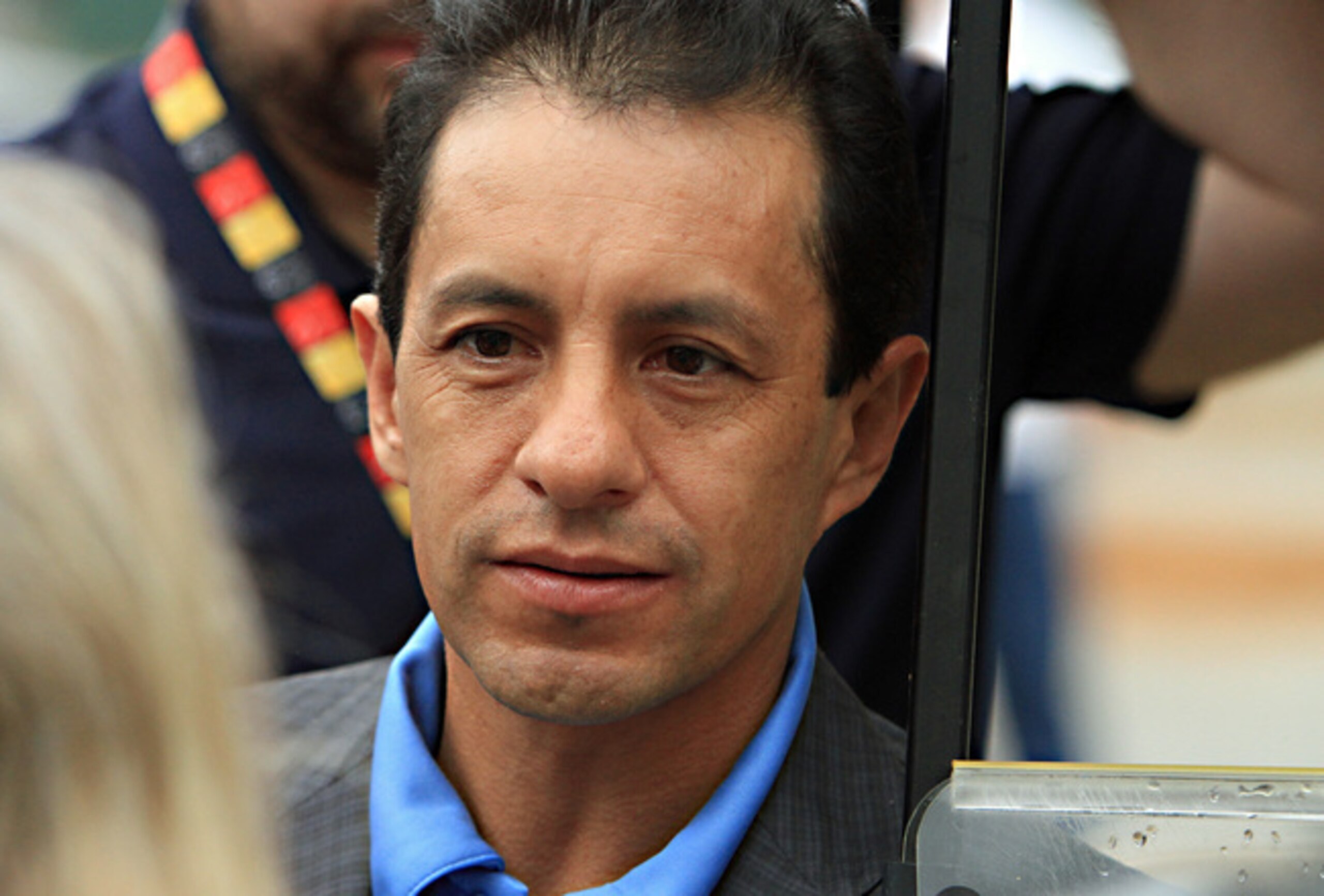 A far drier Victor Espinoza meets with the press after the Preakness.