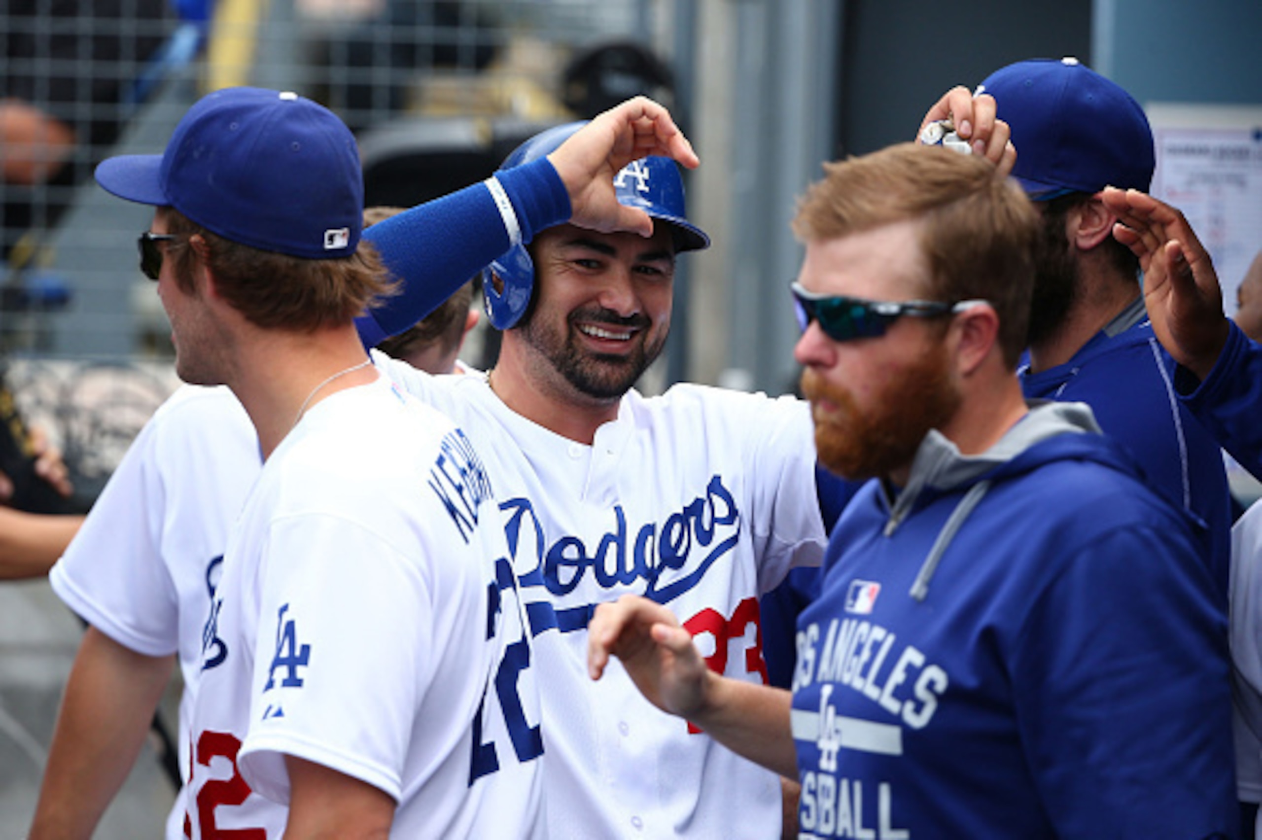 Adrian Gonzalez and the Los Angles Dodgers project to win the most games in baseball at the one-quarter mark.