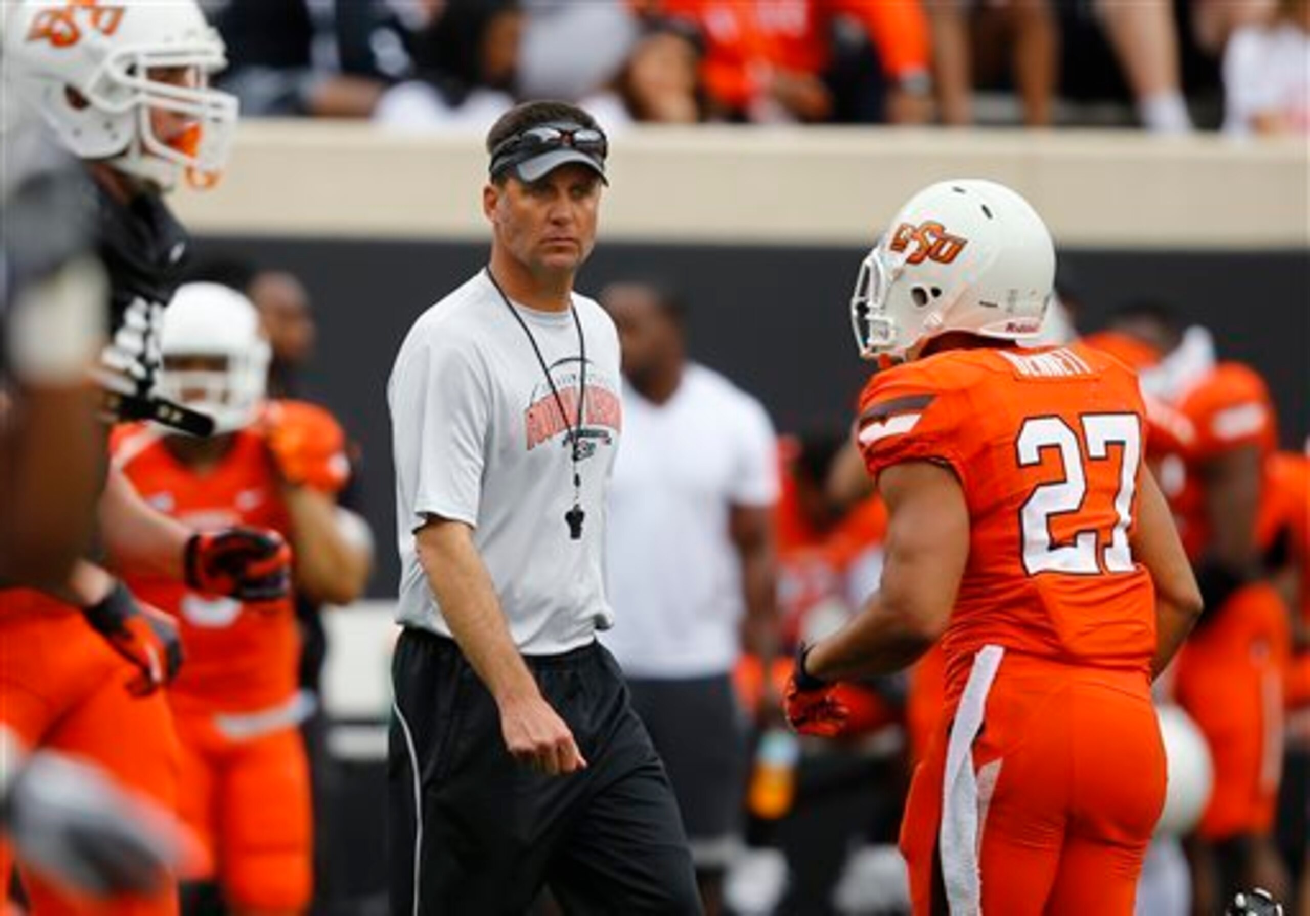 HC Mike Gundy and RB Corey Bennett