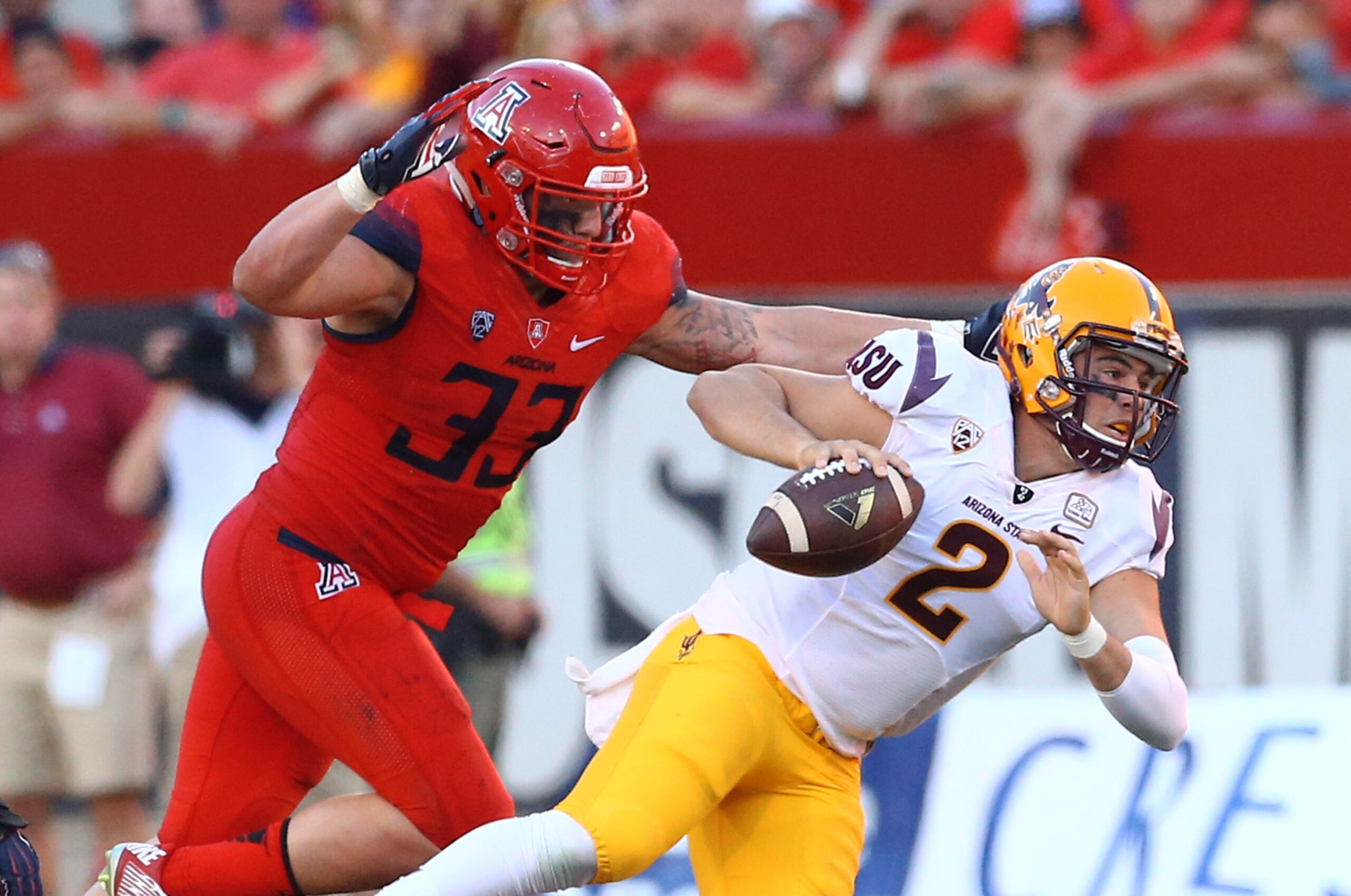 Arizona LB Scooby Wright III (left)