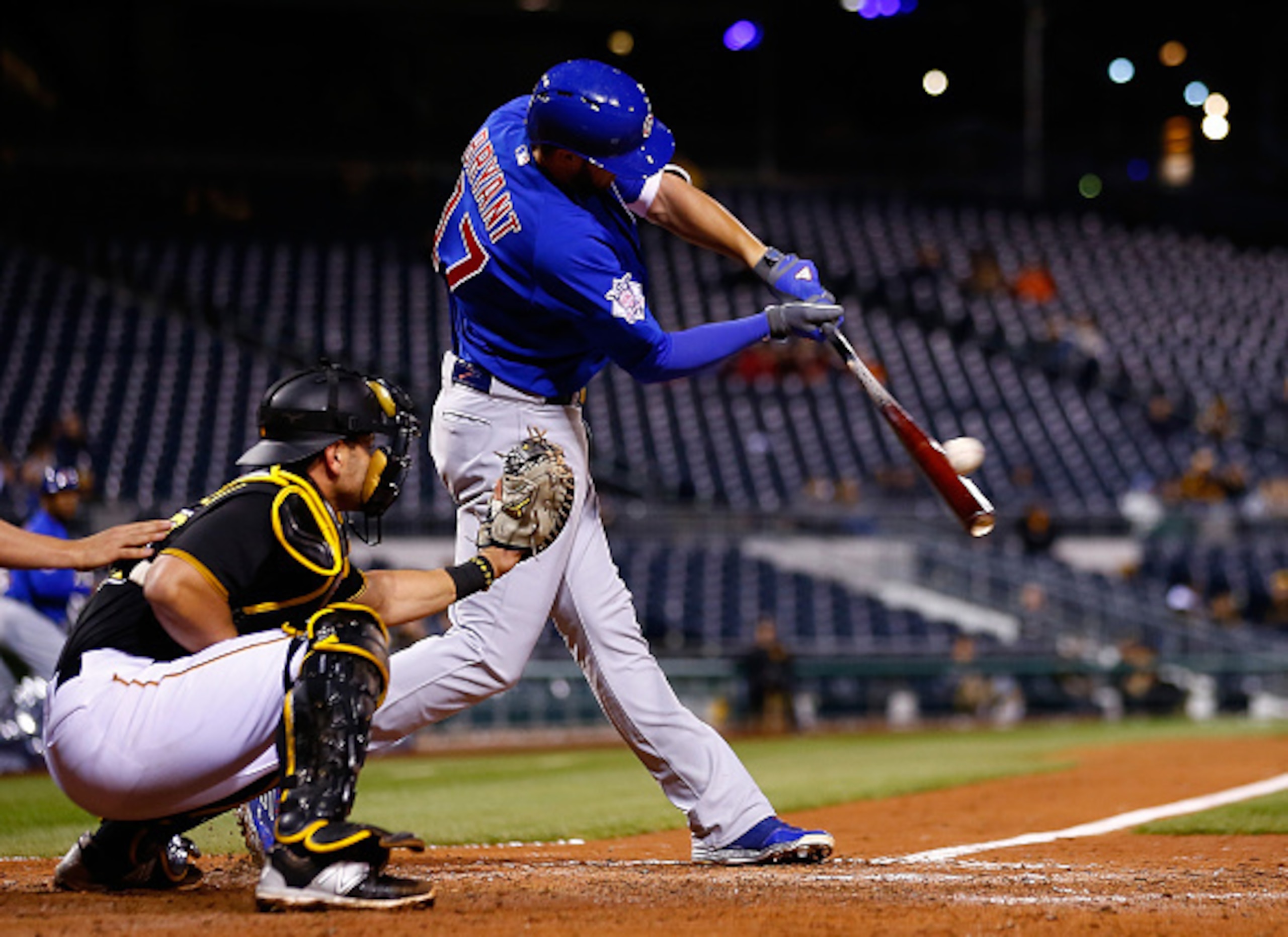 PITTSBURGH, PA - APRIL 20: Kris Bryant #17 of the Chicago Cubs hits an RBI single in the fifth inning against the Pittsburgh Pirates during the game at PNC Park on April 20, 2015 in Pittsburgh, Pennsylvania.  (Photo by Jared Wickerham/Getty Images)