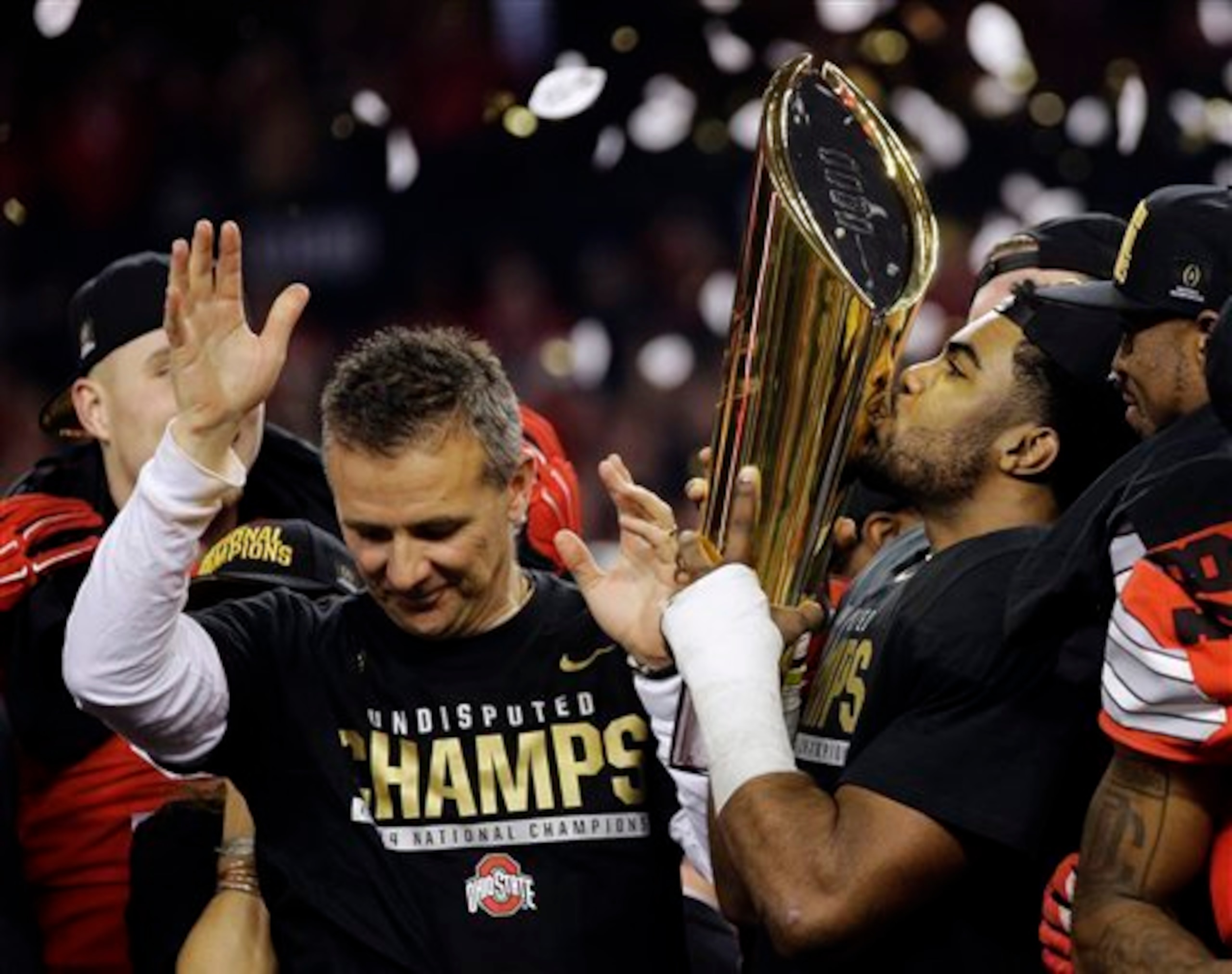 HC Urban Meyer and RB Ezekiel Elliott