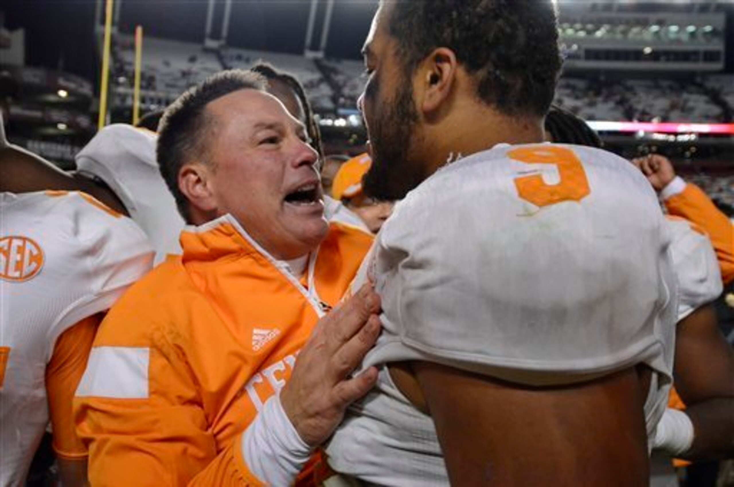 HC Butch Jones and DE Derek Barnett