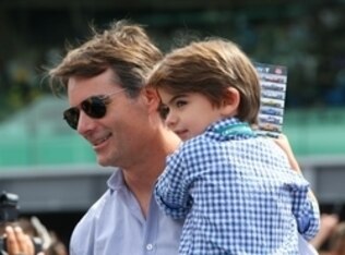 Jeff Gordon, shown here holding son Leo, had a fabulous time pulling double duty last Sunday. Jeff Gordon, shown here holding son Leo, had a fabulous time pulling double duty last Sunday.