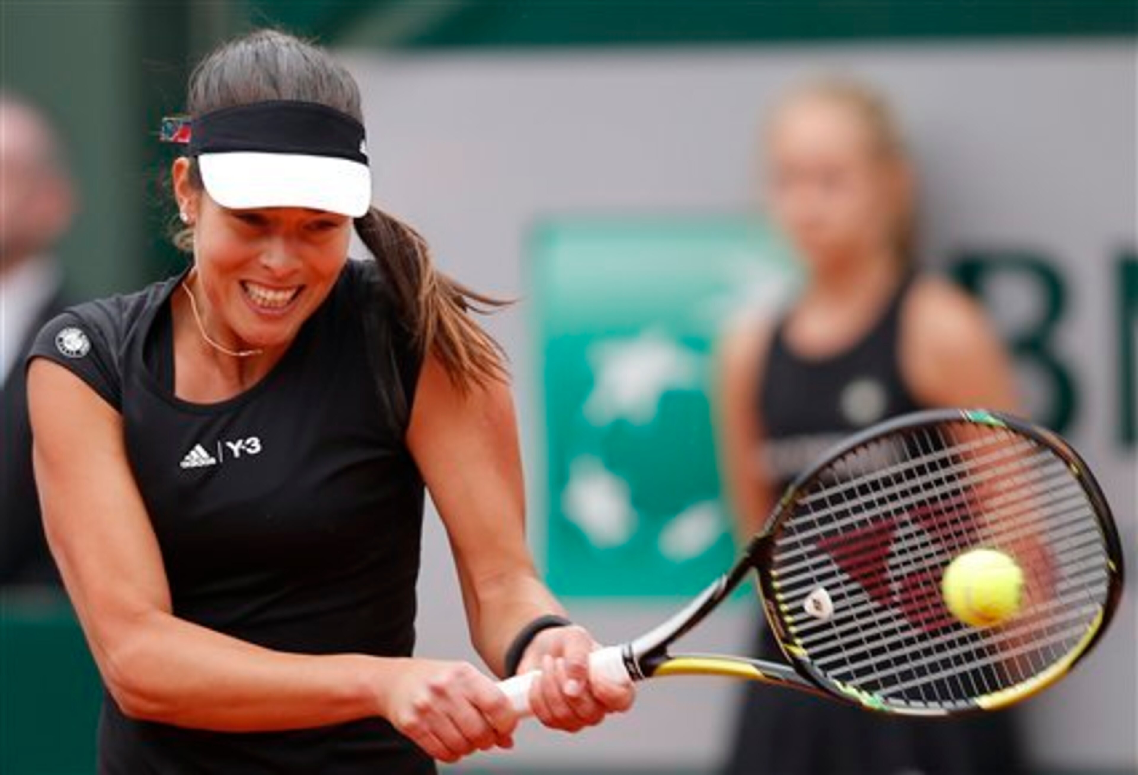 Ana Ivanovic hits a forehand during a match at the 2015 French Open.