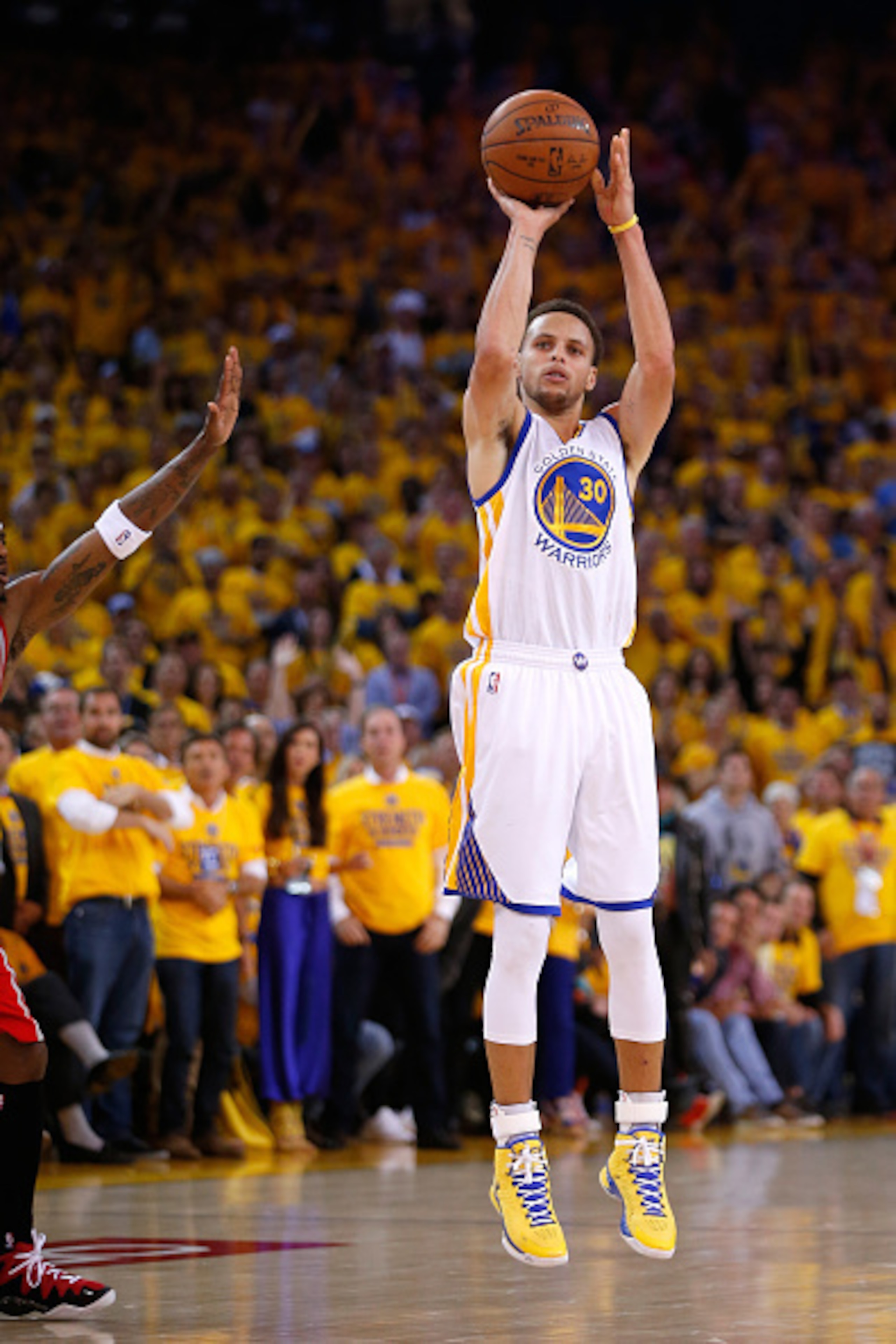 OAKLAND, CA - MAY 27:  Stephen Curry #30 of the Golden State Warriors shoots the ball against the Houston Rockets during game five of the Western Conference Finals of the 2015 NBA Playoffs at ORACLE Arena on May 27, 2015 in Oakland, California. NOTE TO US