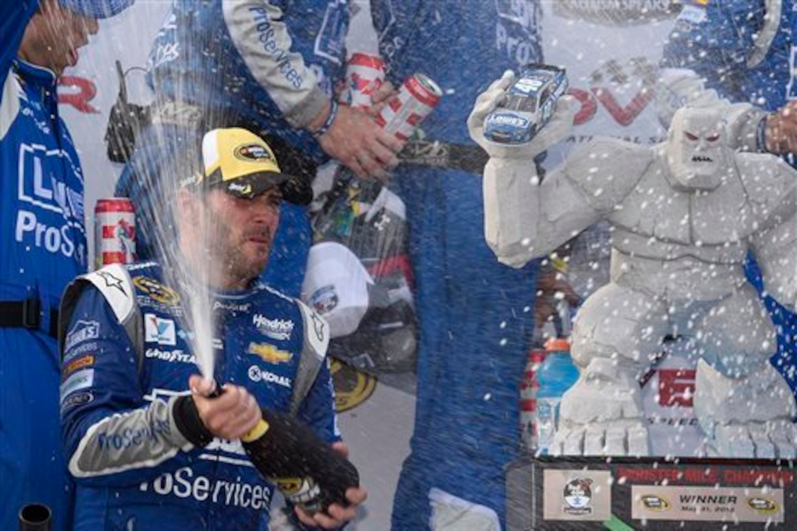 Jimmie Johnson is no stranger to post-race celebrations with Miles the Monster at Dover.