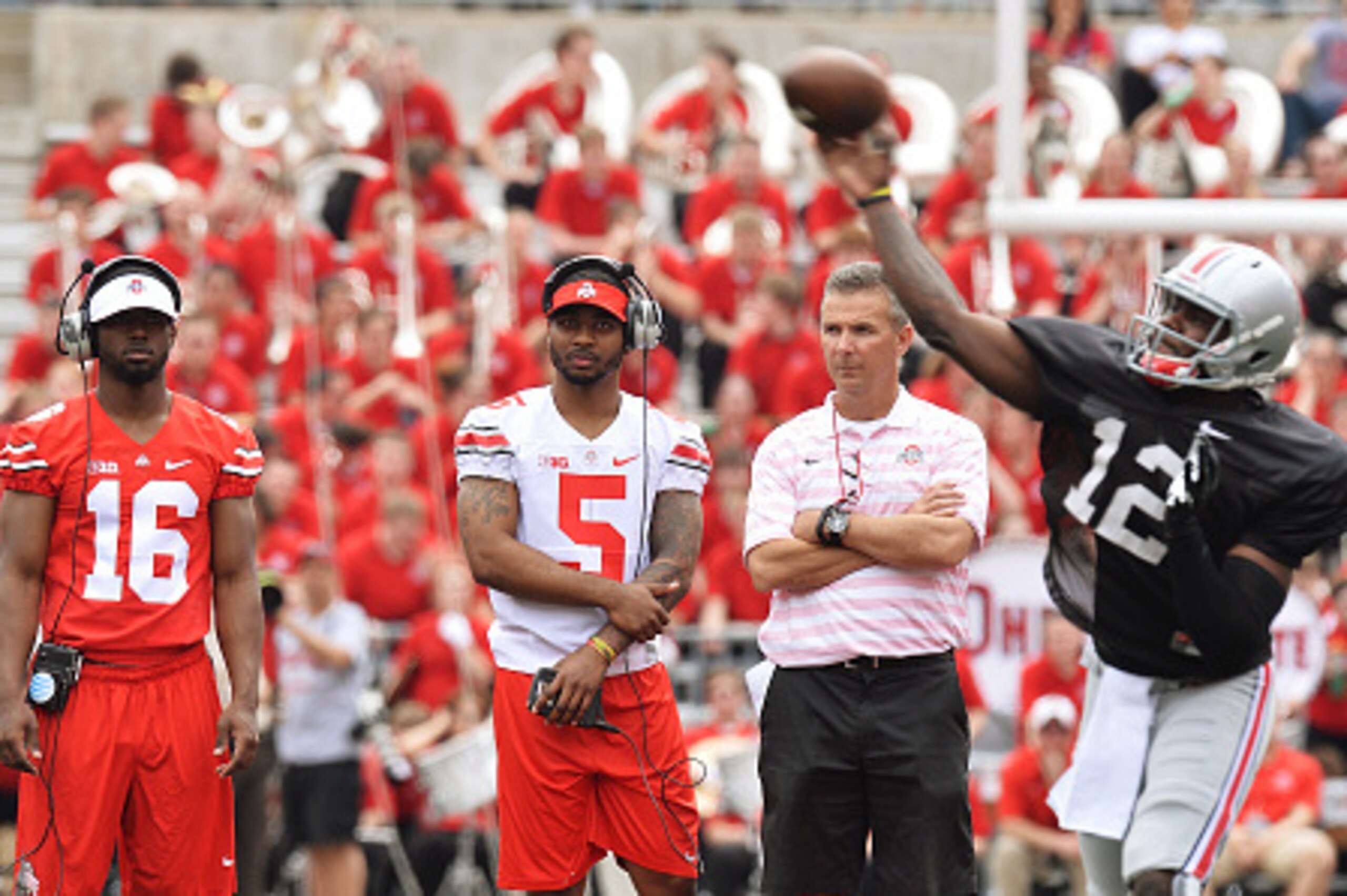From left to right: J.T. Barrett, Braxton Miller, Urban Meyer and Cardale Jones