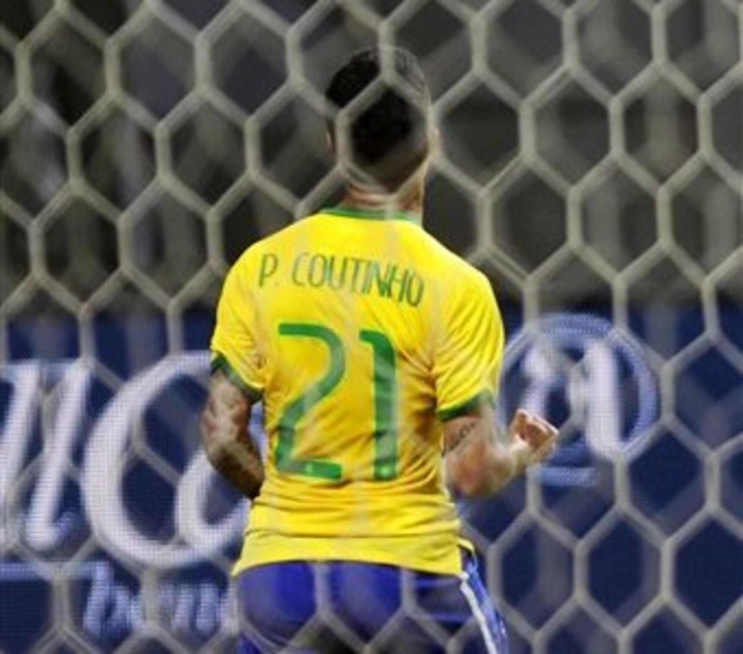 Coutinho celebrates giving Brazil the lead.