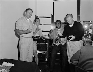 Henke's the one on the left; it's hard to find pictures of '50s defensive linemen!