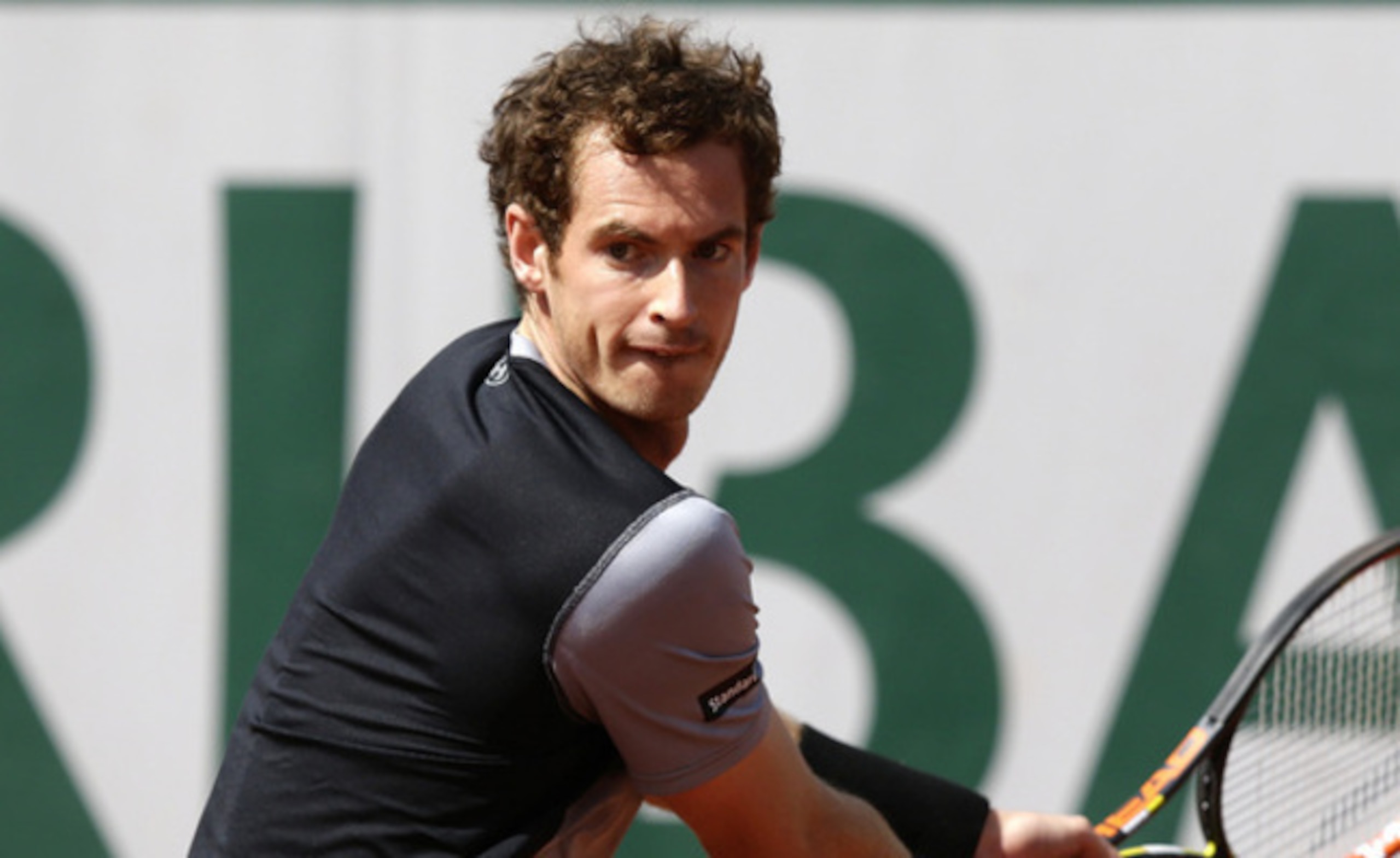 Andy Murray prepares to hit a backhand during his match against David Ferrer at the 2015 French Open.
