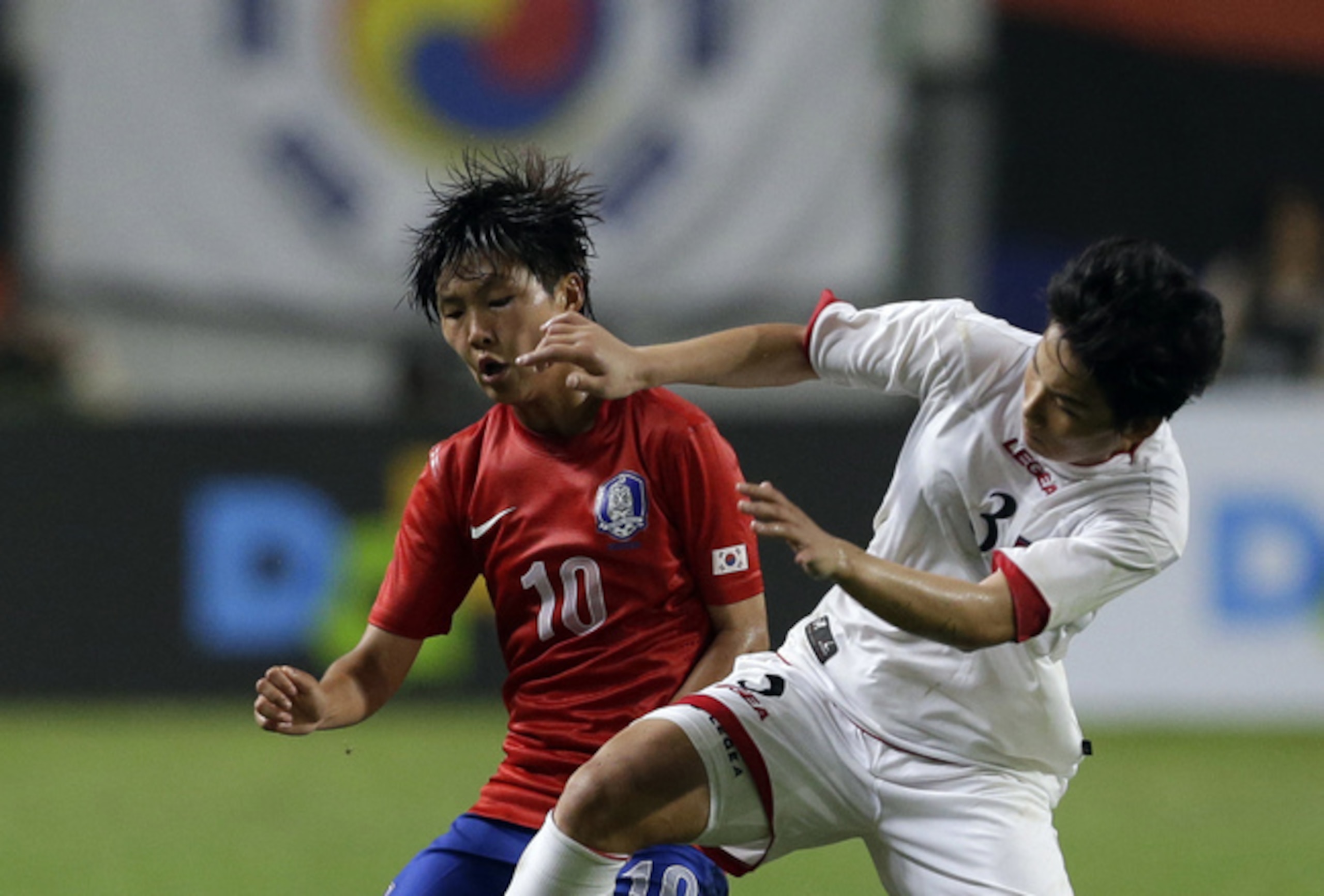 South Korea's Ji So-yun, left, was named the 2014-15 PFA Women's Players' Player of the Year.