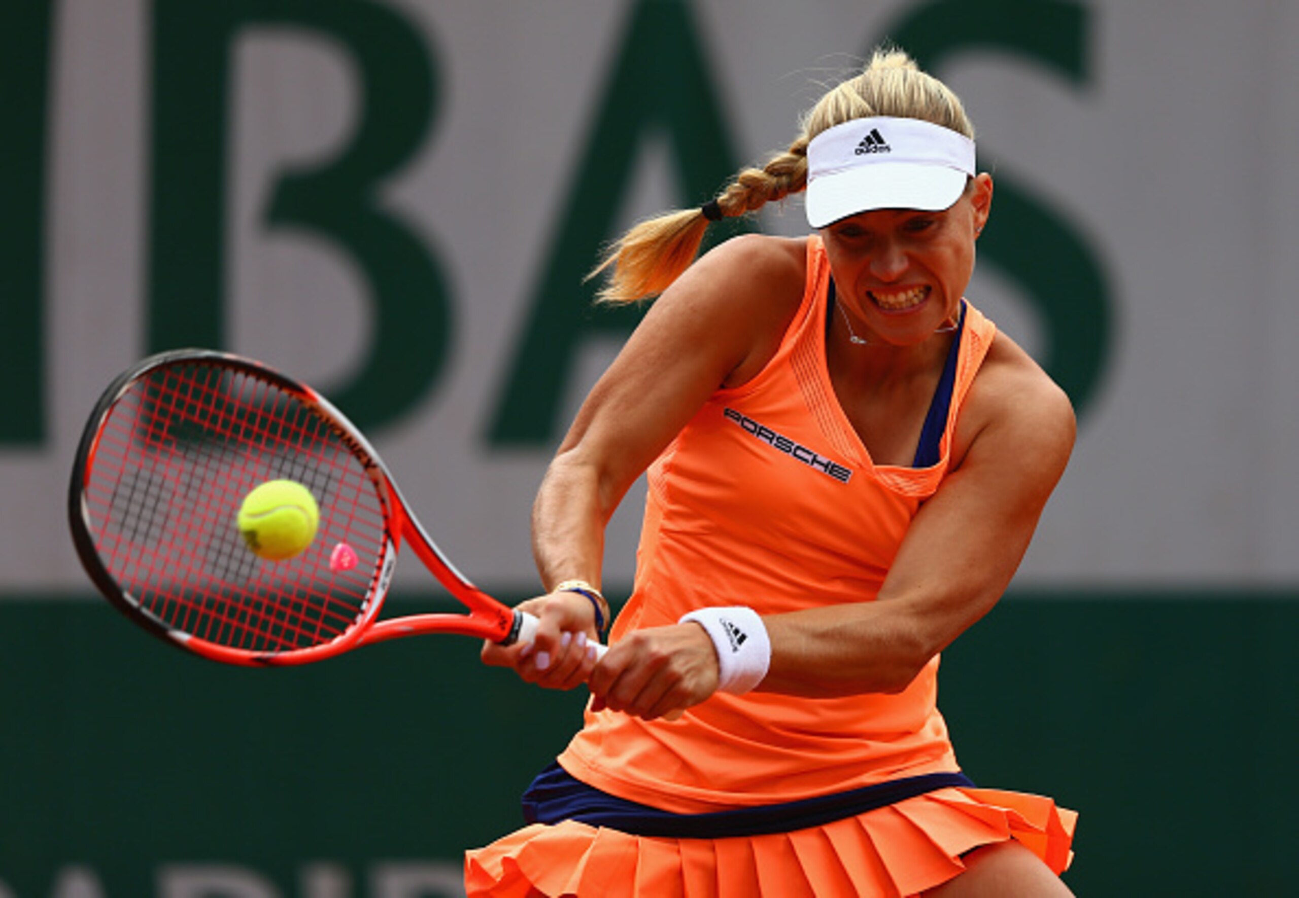 Angelique Kerber hits a backhand during a match at the 2015 French Open.