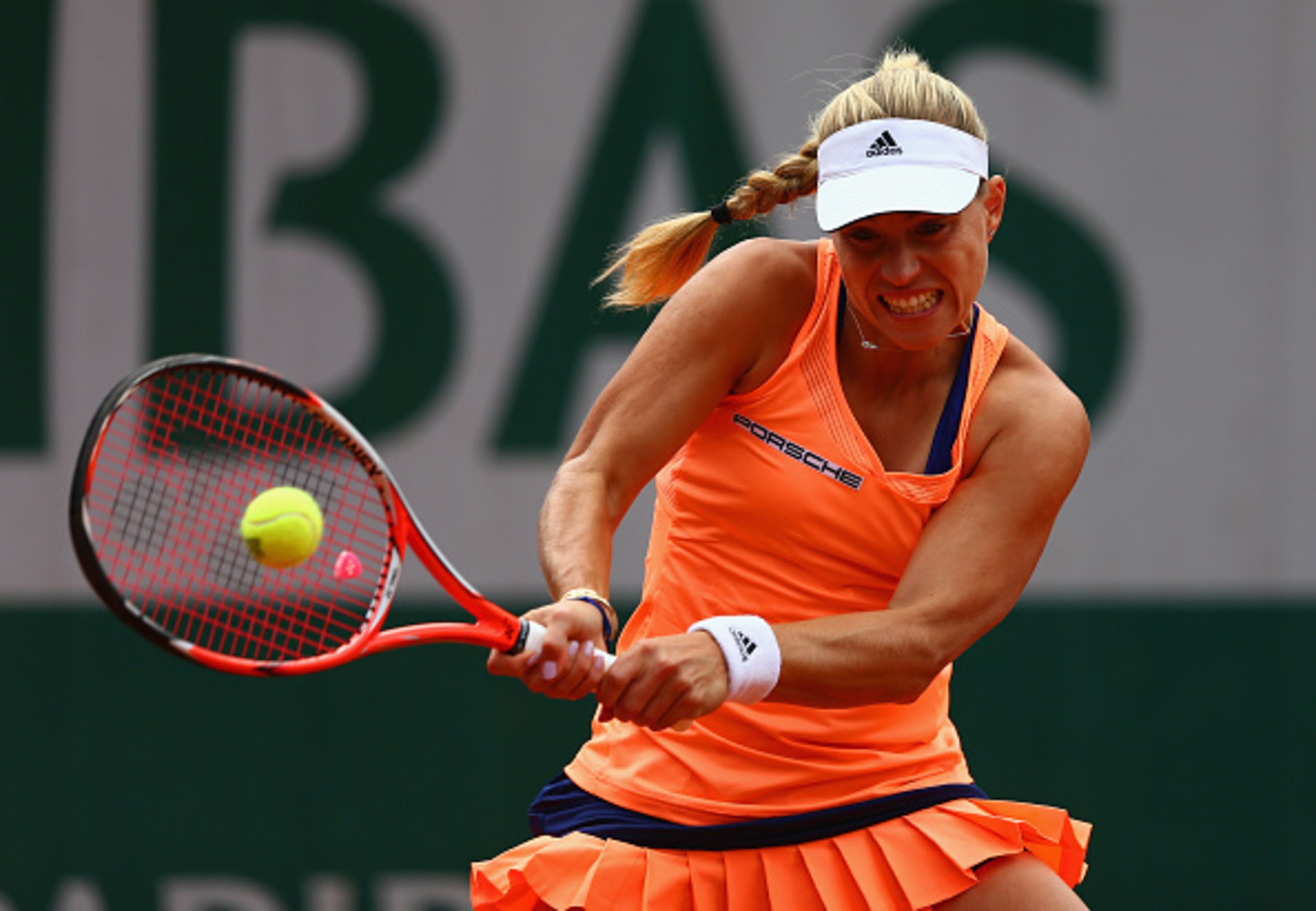 Angelique Kerber hits a backhand during a match at the 2015 French Open.