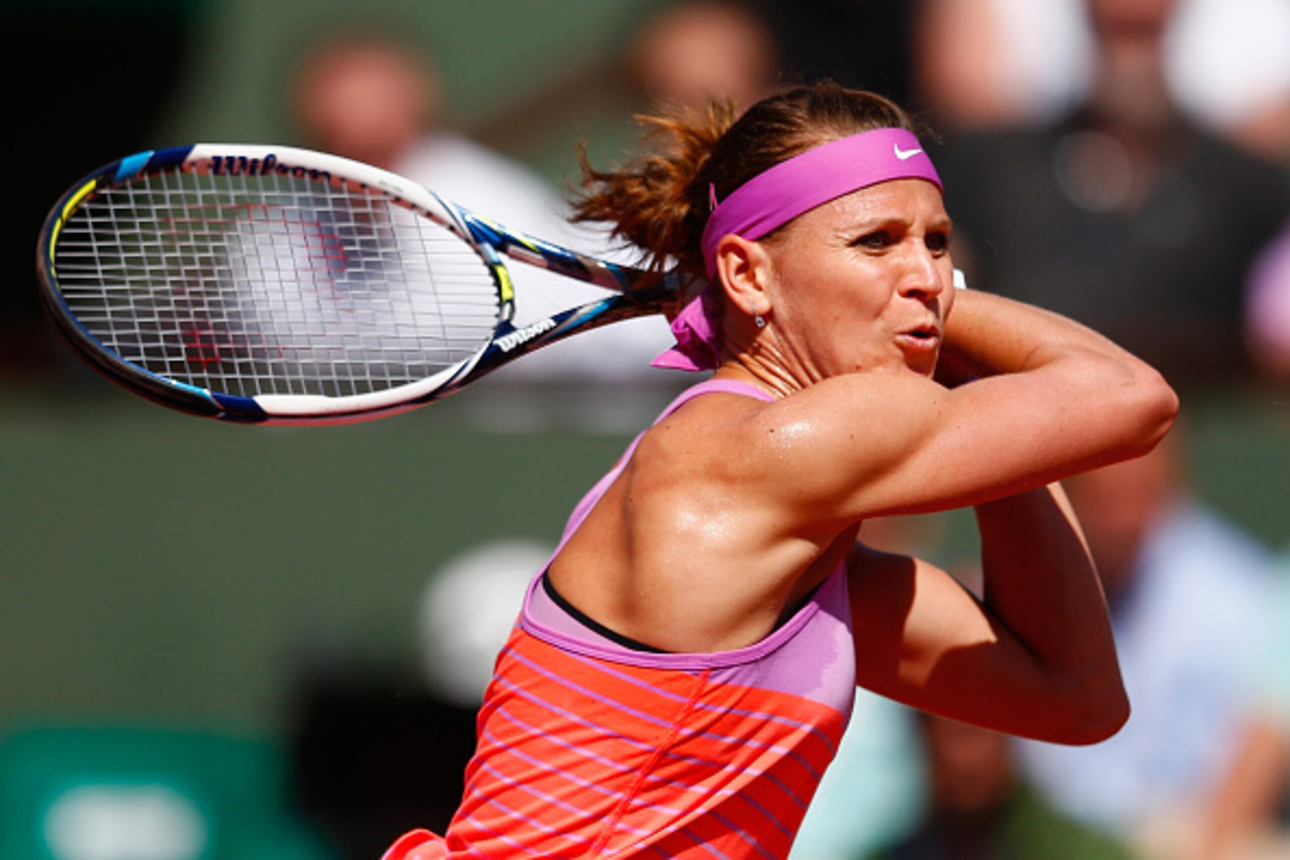 Lucie Safarova hits a backhand during a semifinal match at the 2015 French Open.