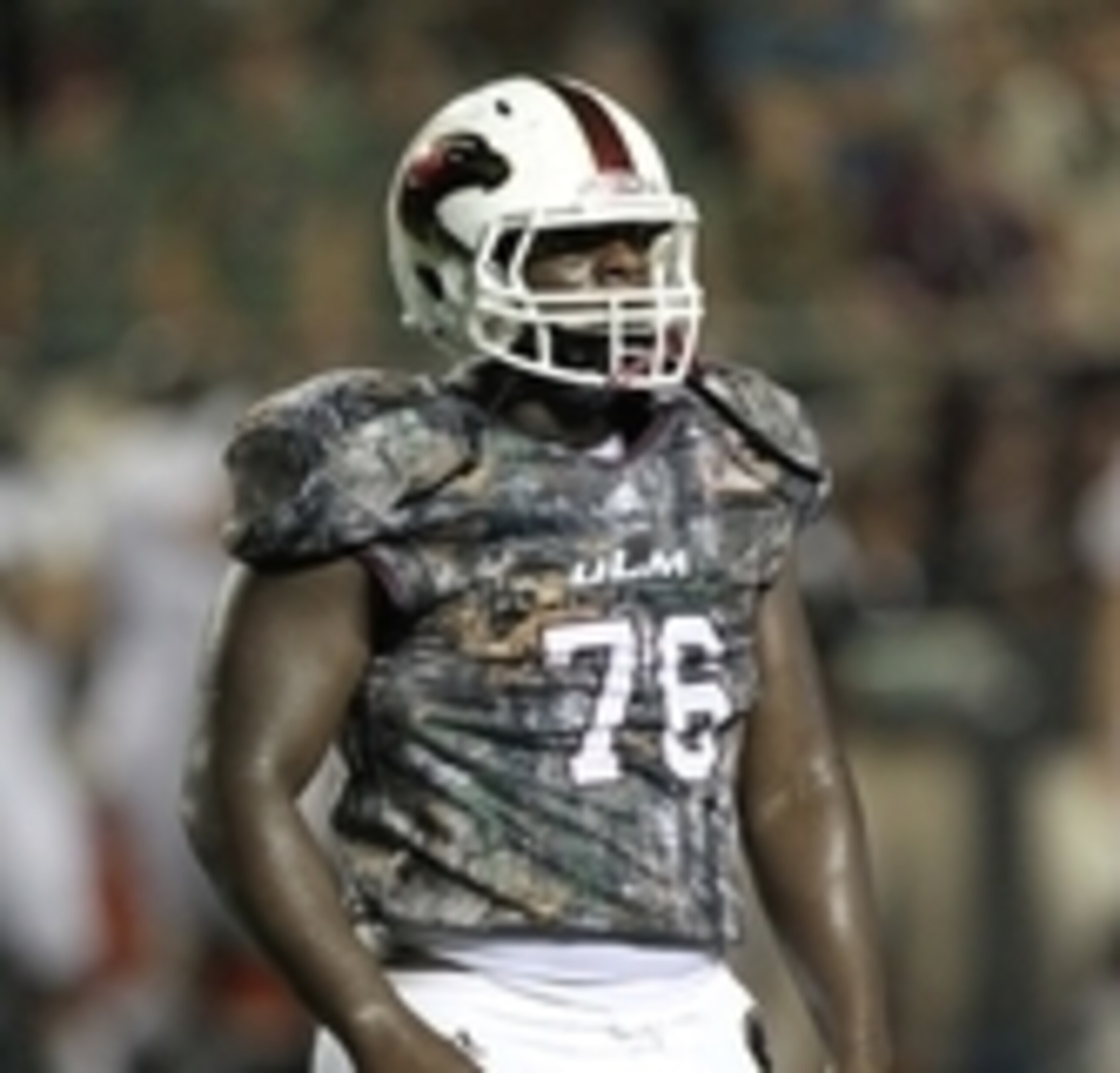Aug 28, 2014; Monroe, LA, USA; Louisiana Monroe Warhawks defensive lineman Gerrand Johnson (76) during the game against the Wake Forest Demon Deacons at Malone Stadium. Warhawks defeated the Demon Deacons 17-10. Mandatory Credit: Nelson Chenault-USA TODAY