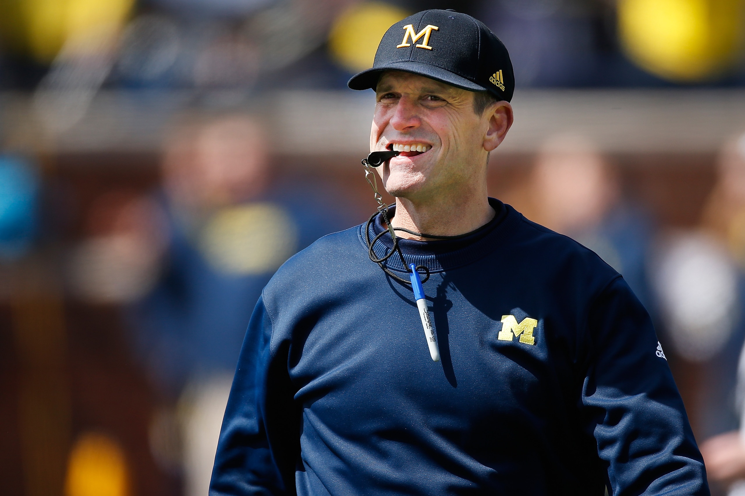Michigan coach Jim Harbaugh is making noise on the recruiting trail via the "Swarm Tour."
