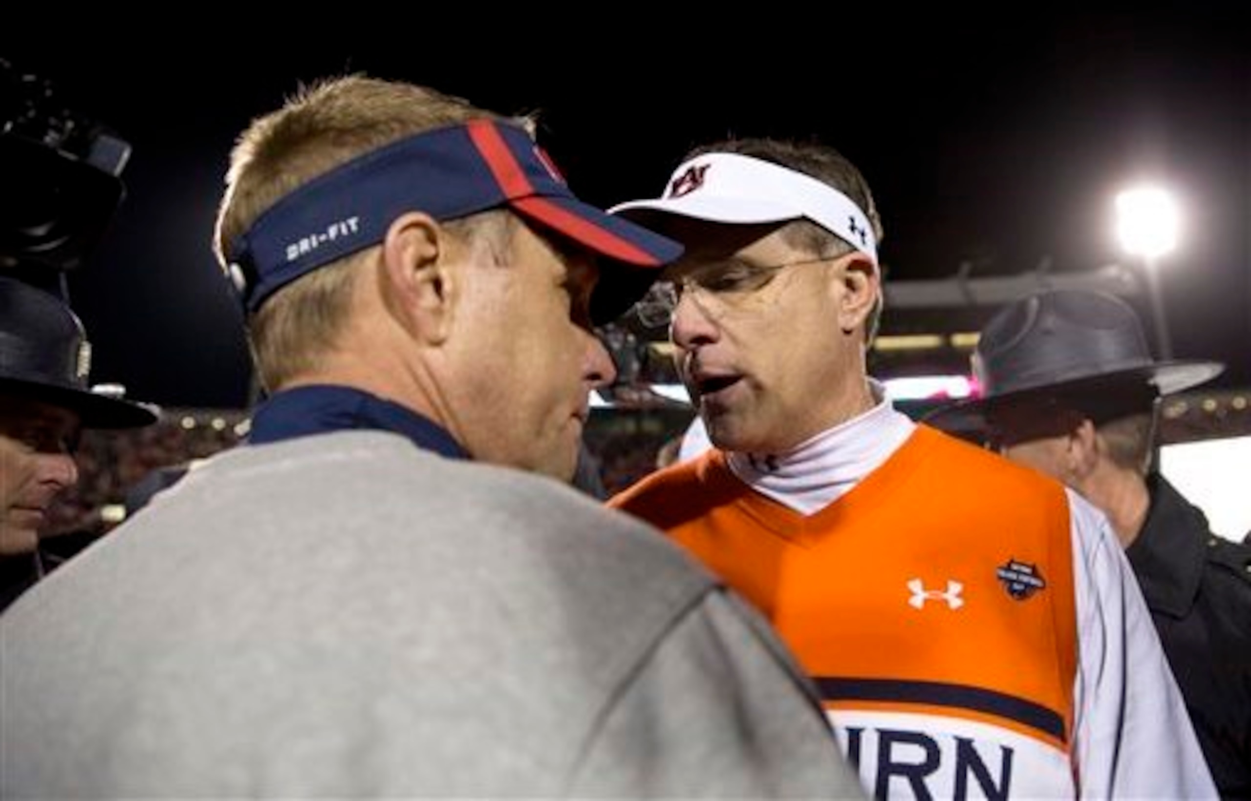 Ole Miss head coach Hugh Freeze (left) and Auburn head coach Gus Malzahn Ole Miss head coach Hugh Freeze (left) and Auburn head coach Gus Malzahn