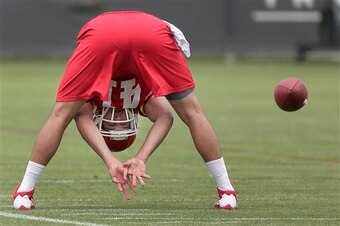 James Winchester practices long-snapping during OTAs.