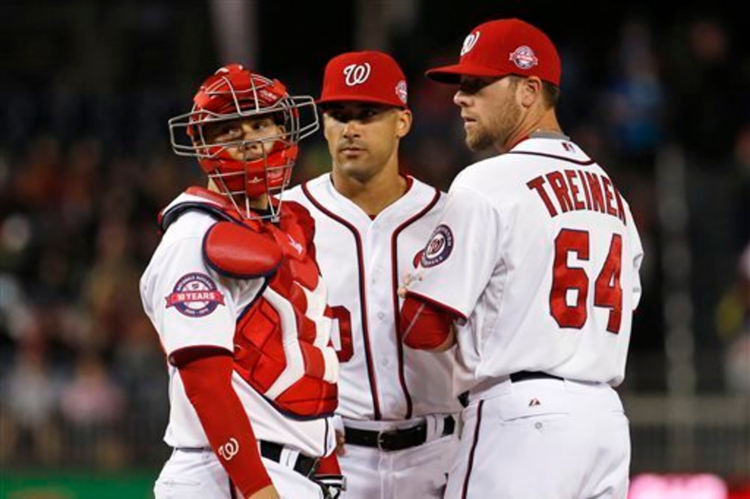 Ian Desmond's (center) impending free agency and Blake Treinen's (right) inconsistency make up some issues Washington must address before the trade deadline.