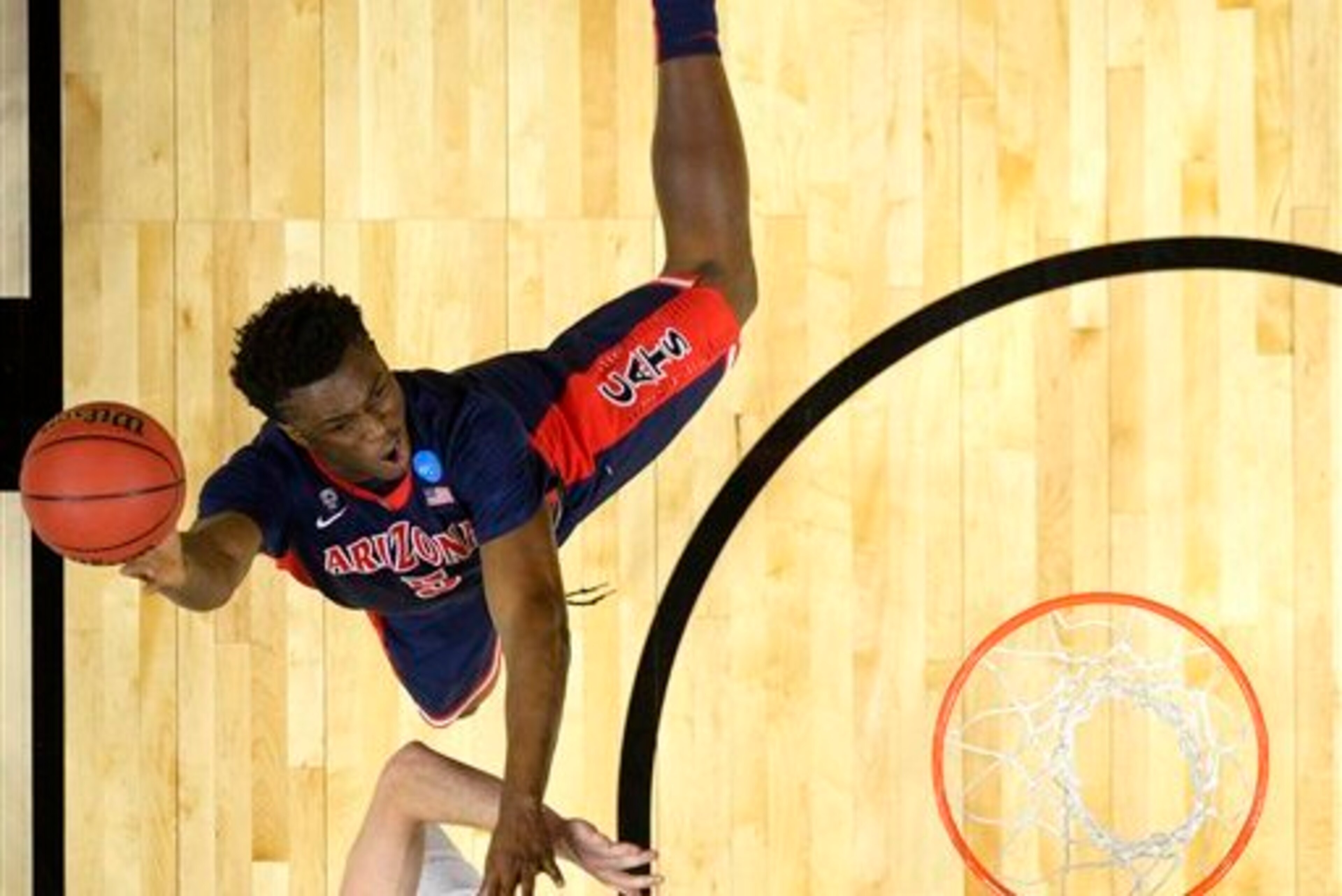 Stanley Johnson skies for the throwdown against Wisconsin