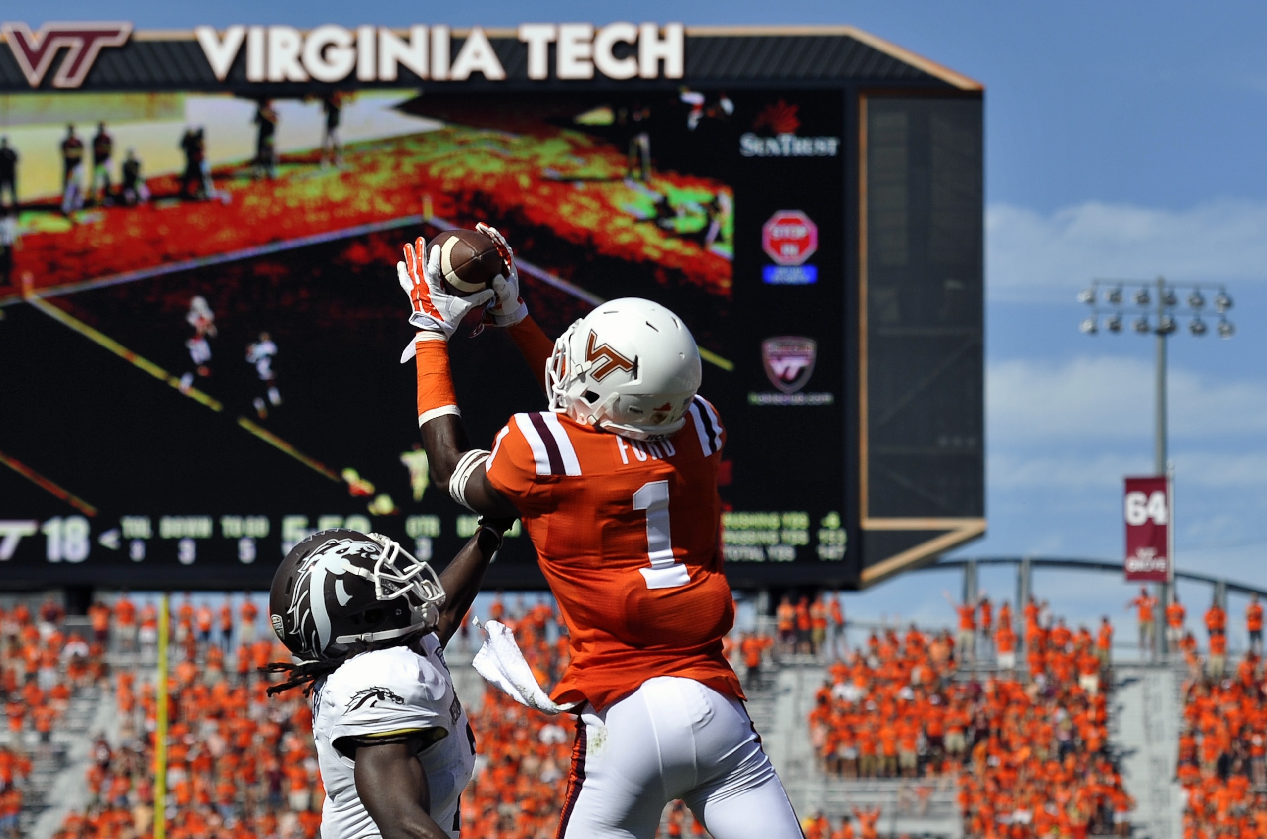 Virginia Tech receiver Isaiah Ford goes up high for a catch in a 2014 win.