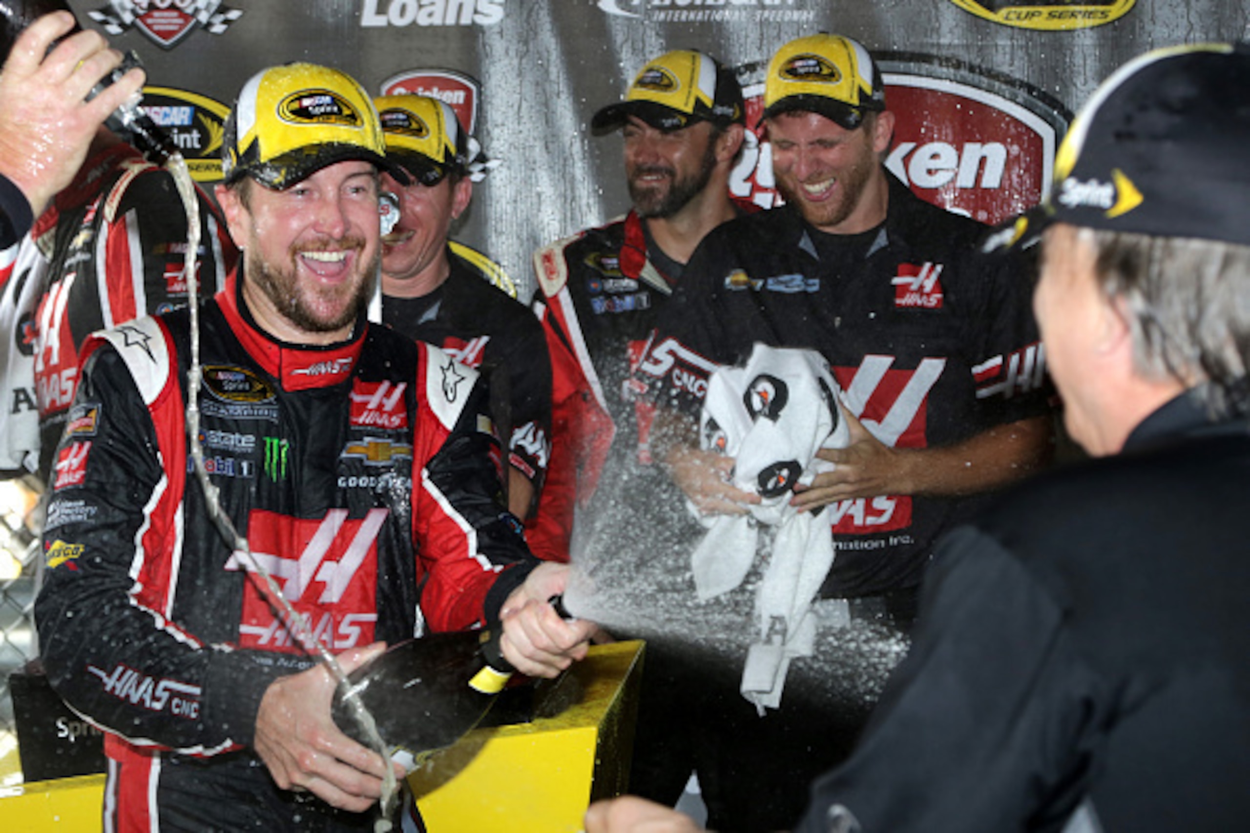 Kurt Busch (left) scored victory No. 2 of the season at Michigan.