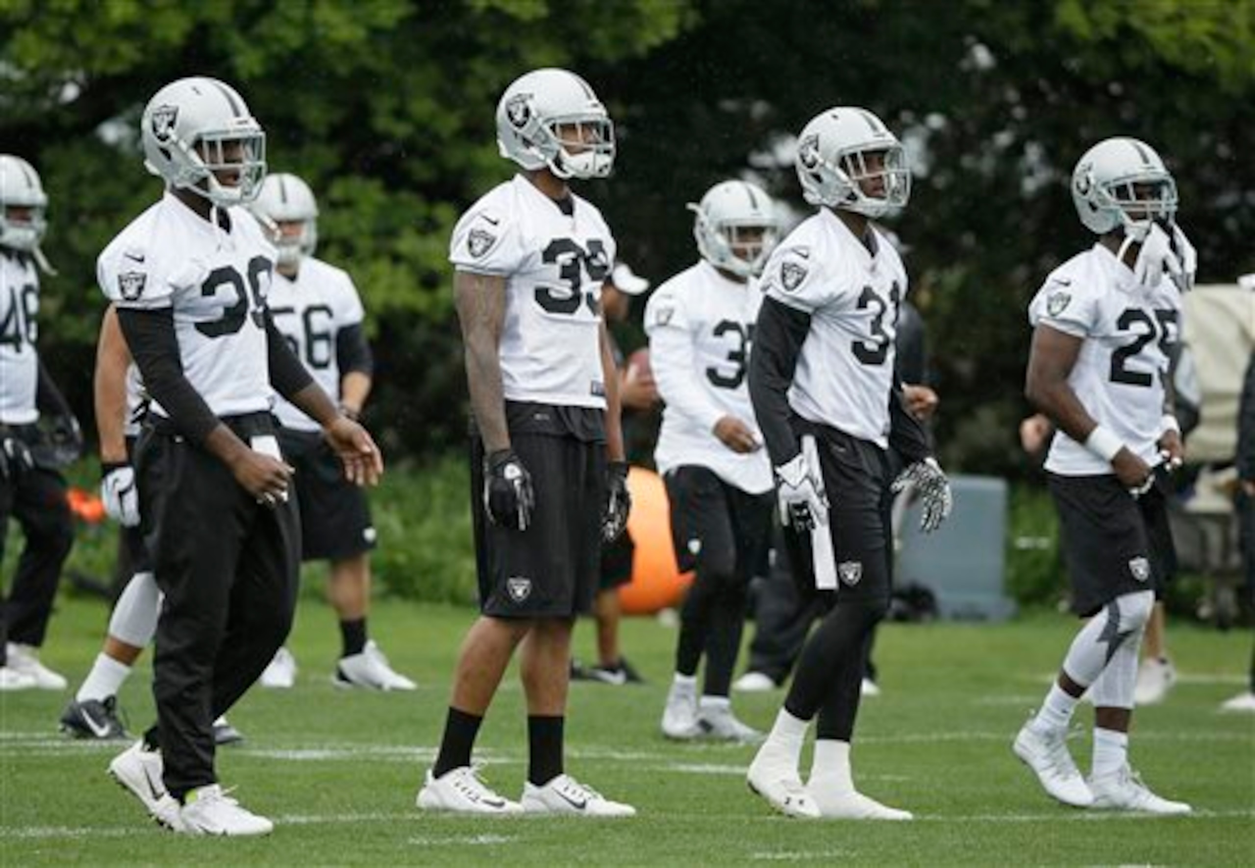 (left to right) Travis Carrie, Keith McGill, Neiko Thorpe, D.J. Hayden