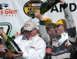 Kevin Harvick poured champagne on then-car owner Richard Childress after winning at Watkins Glen in 2006.