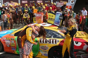 Kyle Busch celebrated in style with his wife, Samantha, after winning at WGI in 2009.