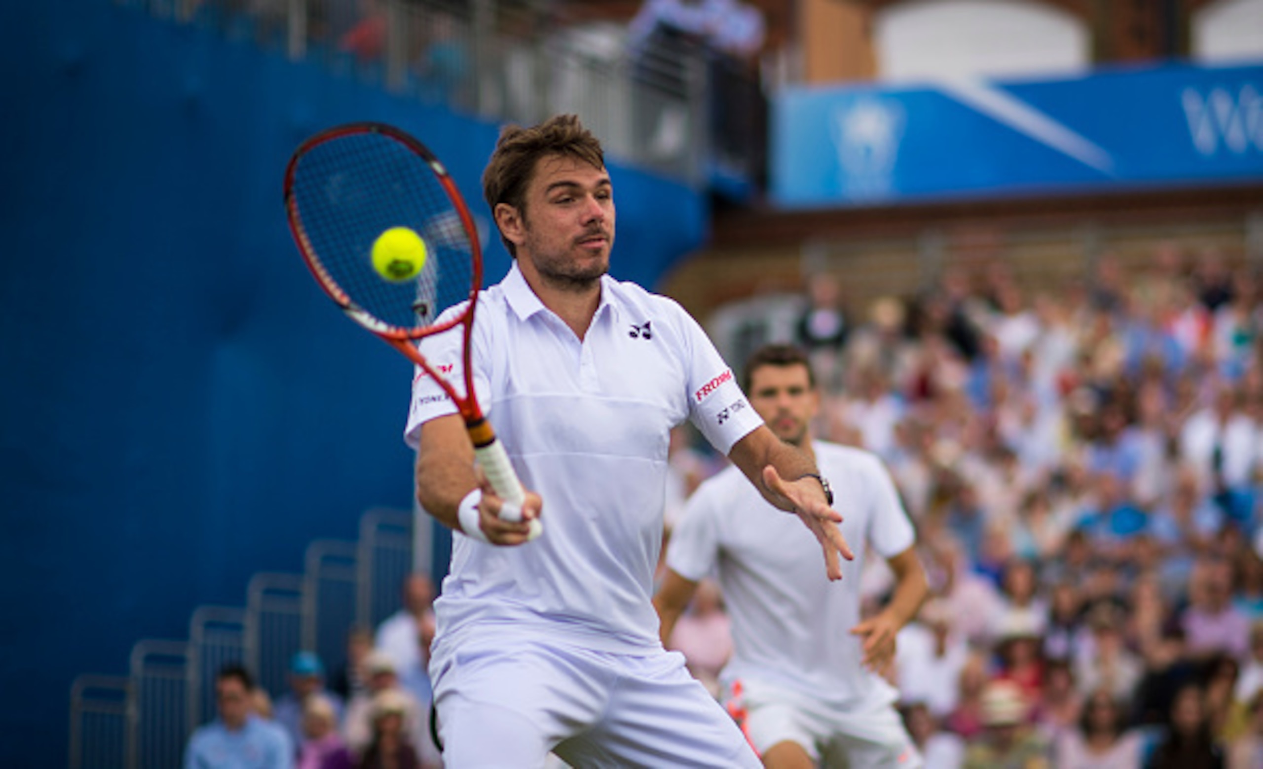 Stan Wawrinka plays doubles with Grigor Dimitrov at the 2015 Aegon Championships.