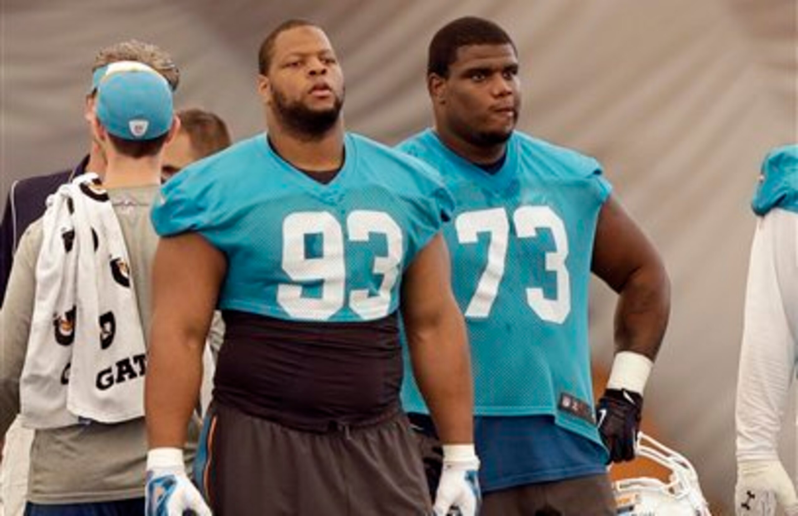 Ellis McCarthy (73, right) has a lot to learn before he could ever hope to reach the potential of Ndamukong Suh (93, left).