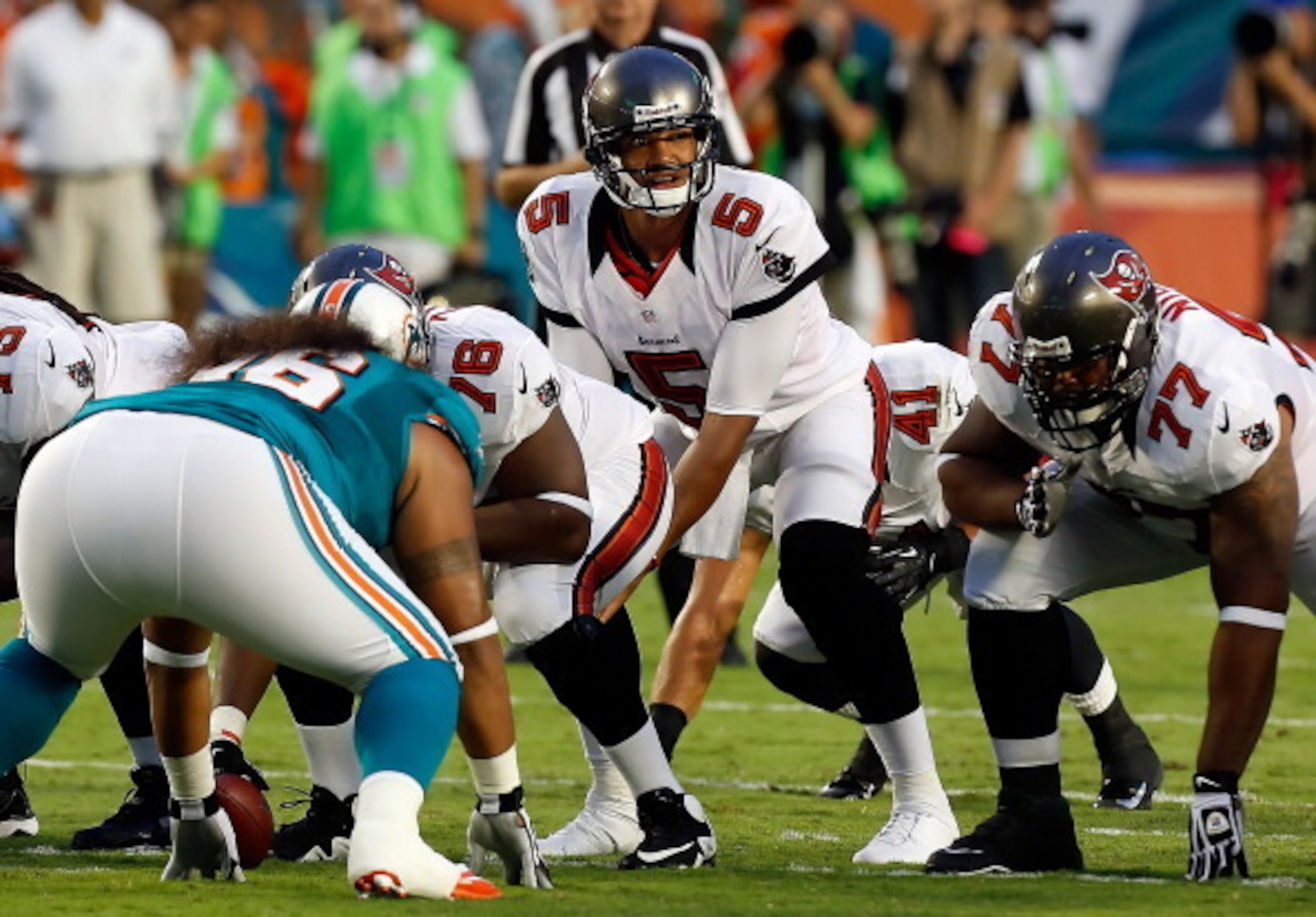Josh Freeman (5, above) is the third best quarterback on the roster, but the Dolphins may not carry three quarterbacks this year.