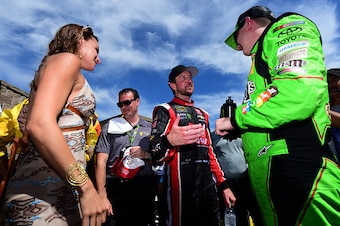 Samantha Busch (left), Kurt Busch (center) and Kyle Busch (far right) had plenty to talk about after Sonoma's big finish for the family.