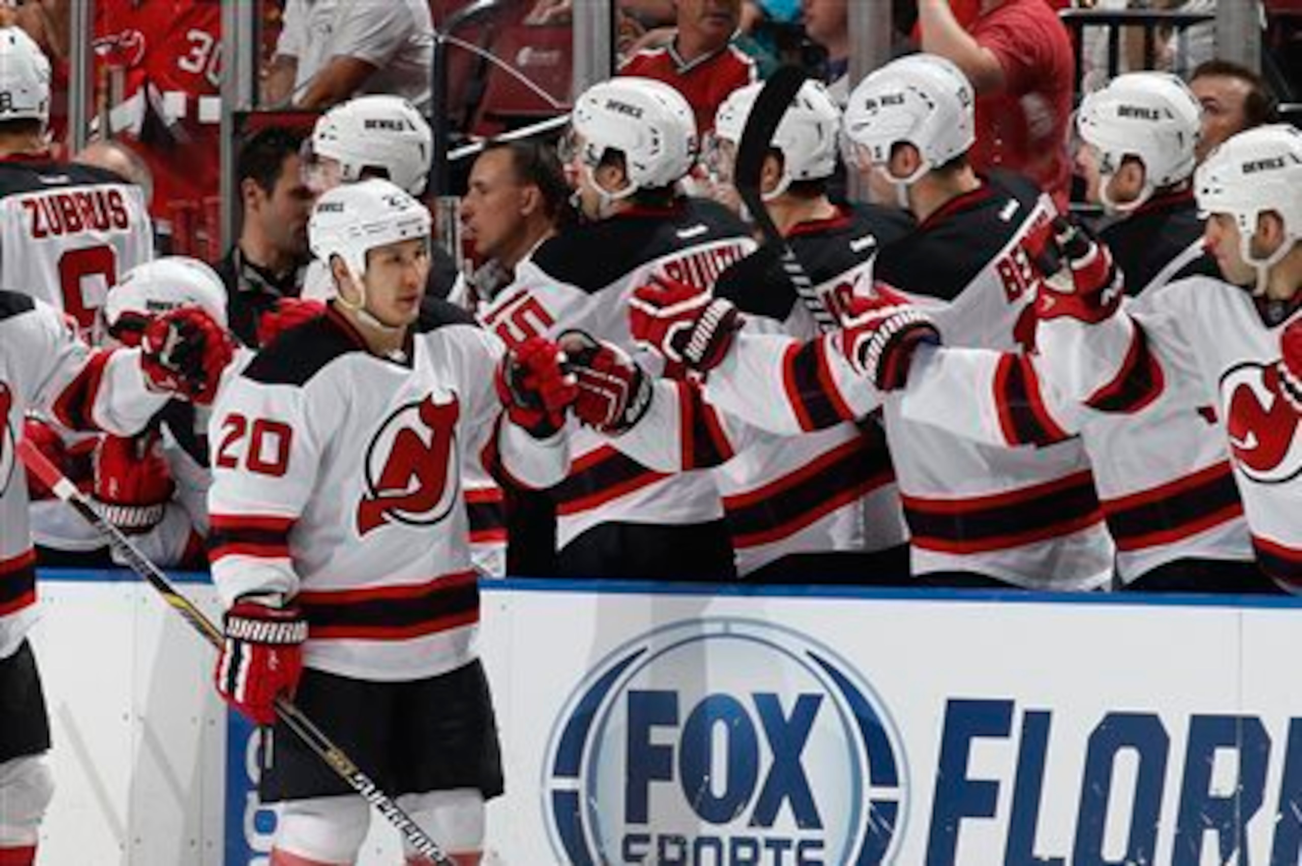 Jordin Tootoo celebrates a goal with his teammates.