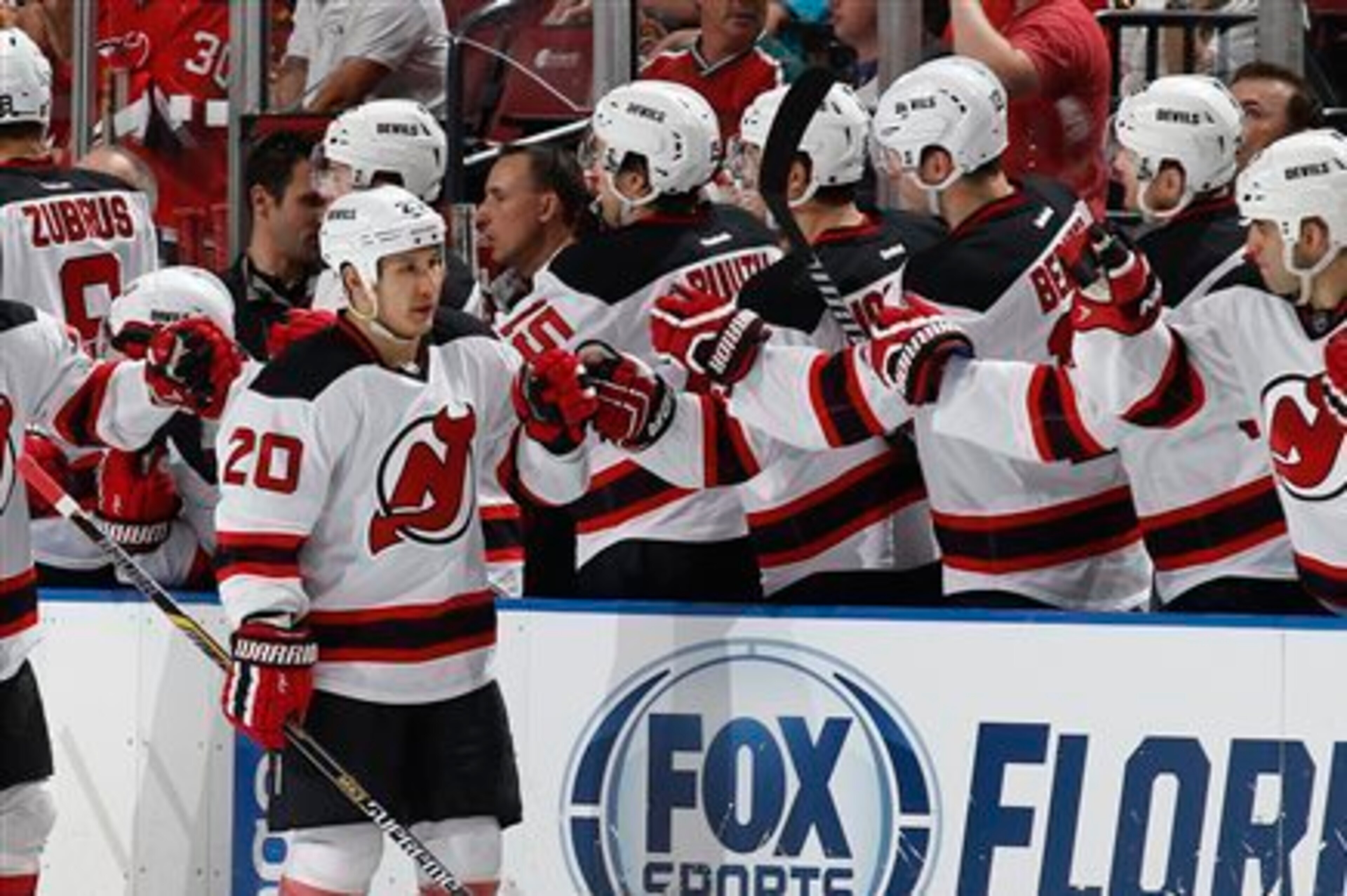 Jordin Tootoo celebrates a goal with his teammates.