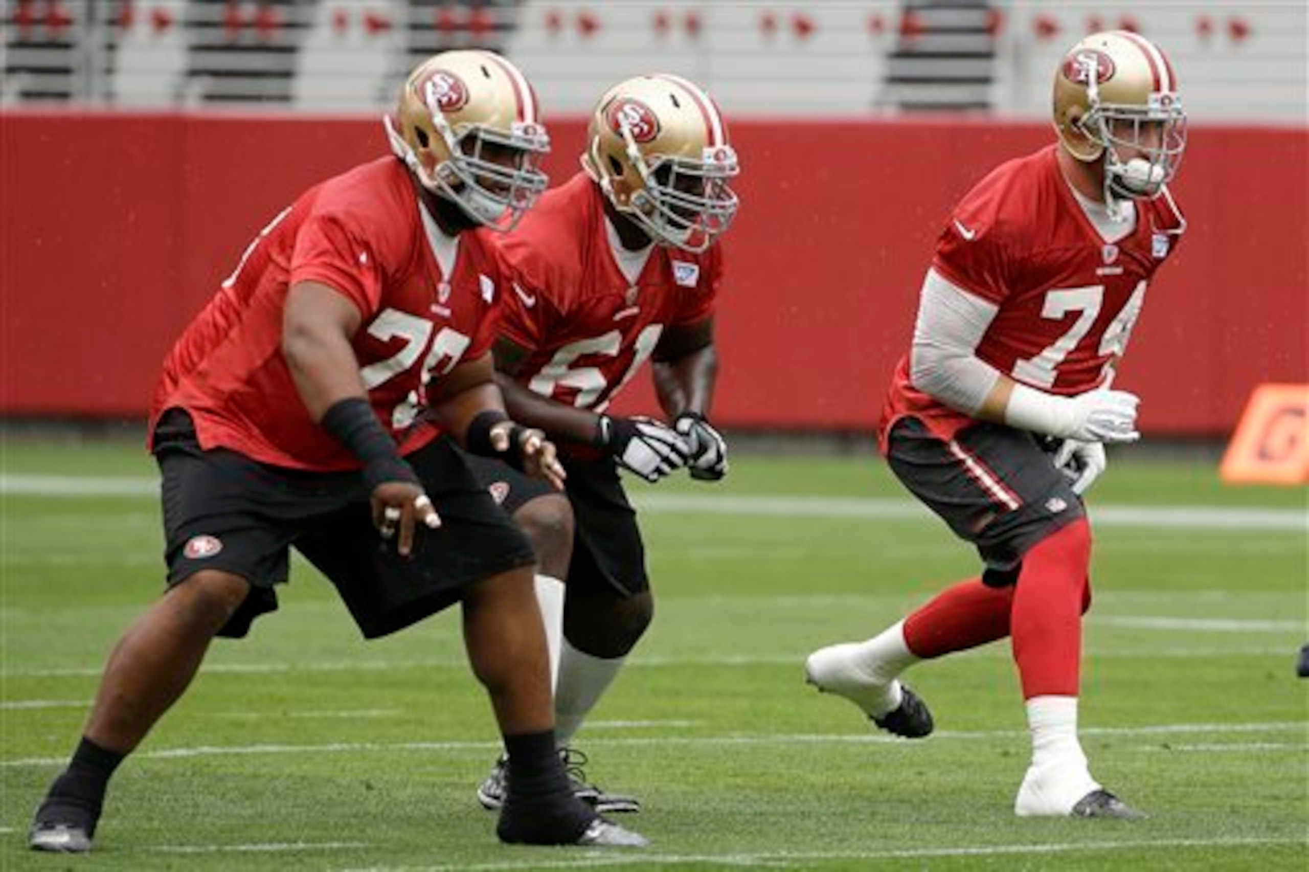 Andrew Tiller (middle) took reps at left guard with the first-team offense during OTAs. Andrew Tiller (middle) took reps at left guard with the first-team offense during OTAs.