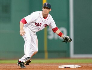 BOSTON - JUNE 29: Mark Loretta #3 of the Boston Red Sox plays a ball against the New York Mets on June 29, 2006 at Fenway Park in Boston, Massachusetts. (Photo by Jim McIsaac/Getty Images)
