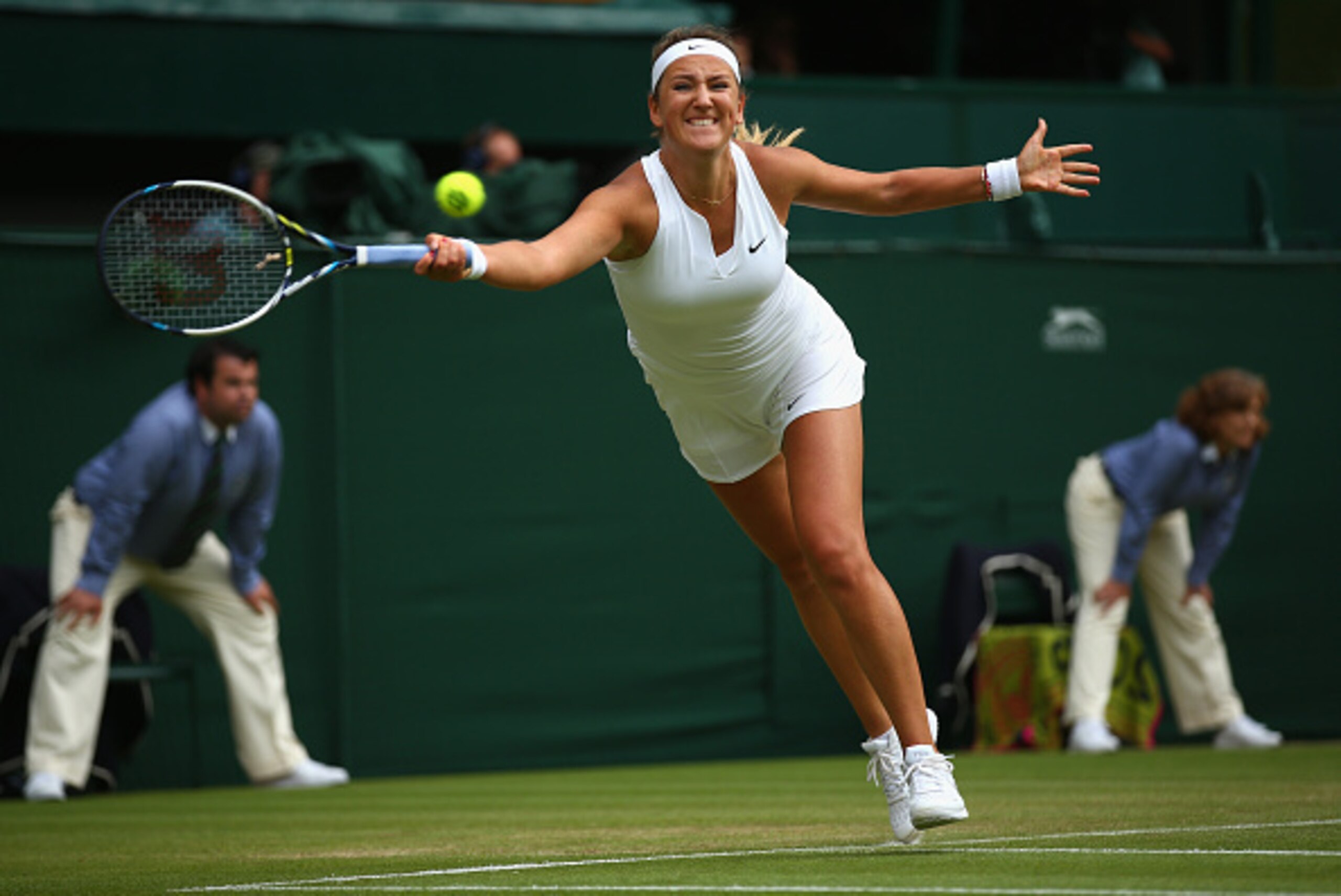 Victoria Azarenka hits a forehand during the quarterfinals at Wimbledon.
