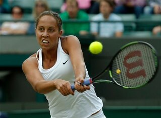 Madison Keys hits a forehand during her quarterfinals match at Wimbledon.