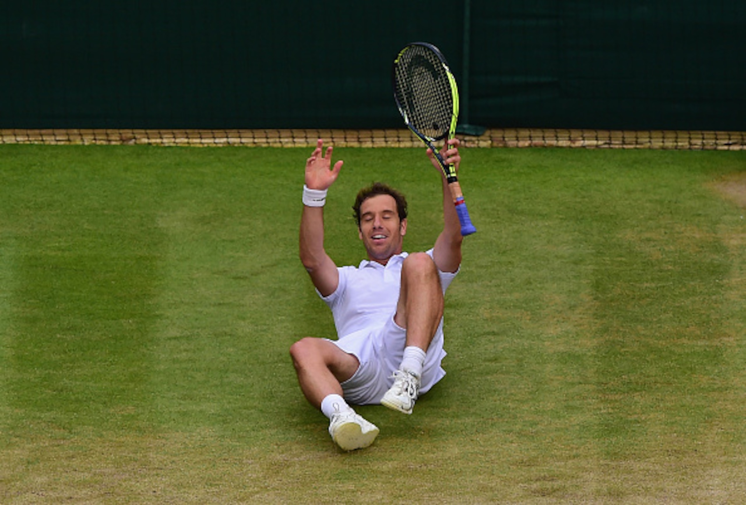 Richard Gasquet celebrates his win over Stan Wawrinka in the quarterfinals at Wimbledon.