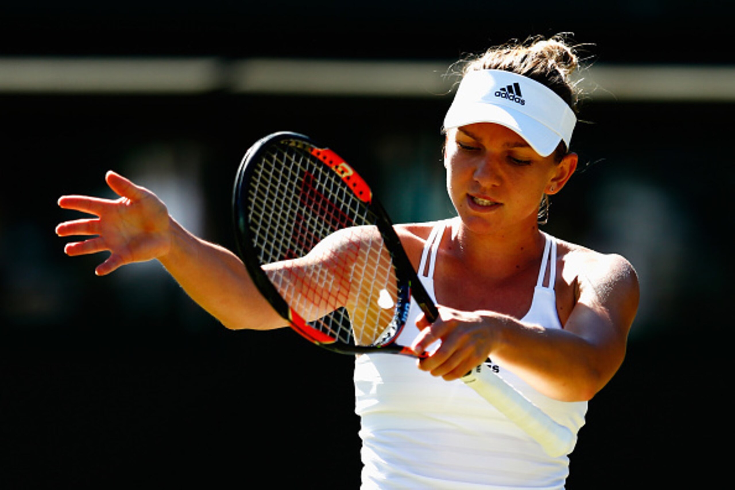 LONDON, ENGLAND - JUNE 30:  Simona Halep of Romania reacts in her Ladies Singles first round match against Jana Cepelova of Slovakia during day two of the Wimbledon Lawn Tennis Championships at the All England Lawn Tennis and Croquet Club on June 30, 2015