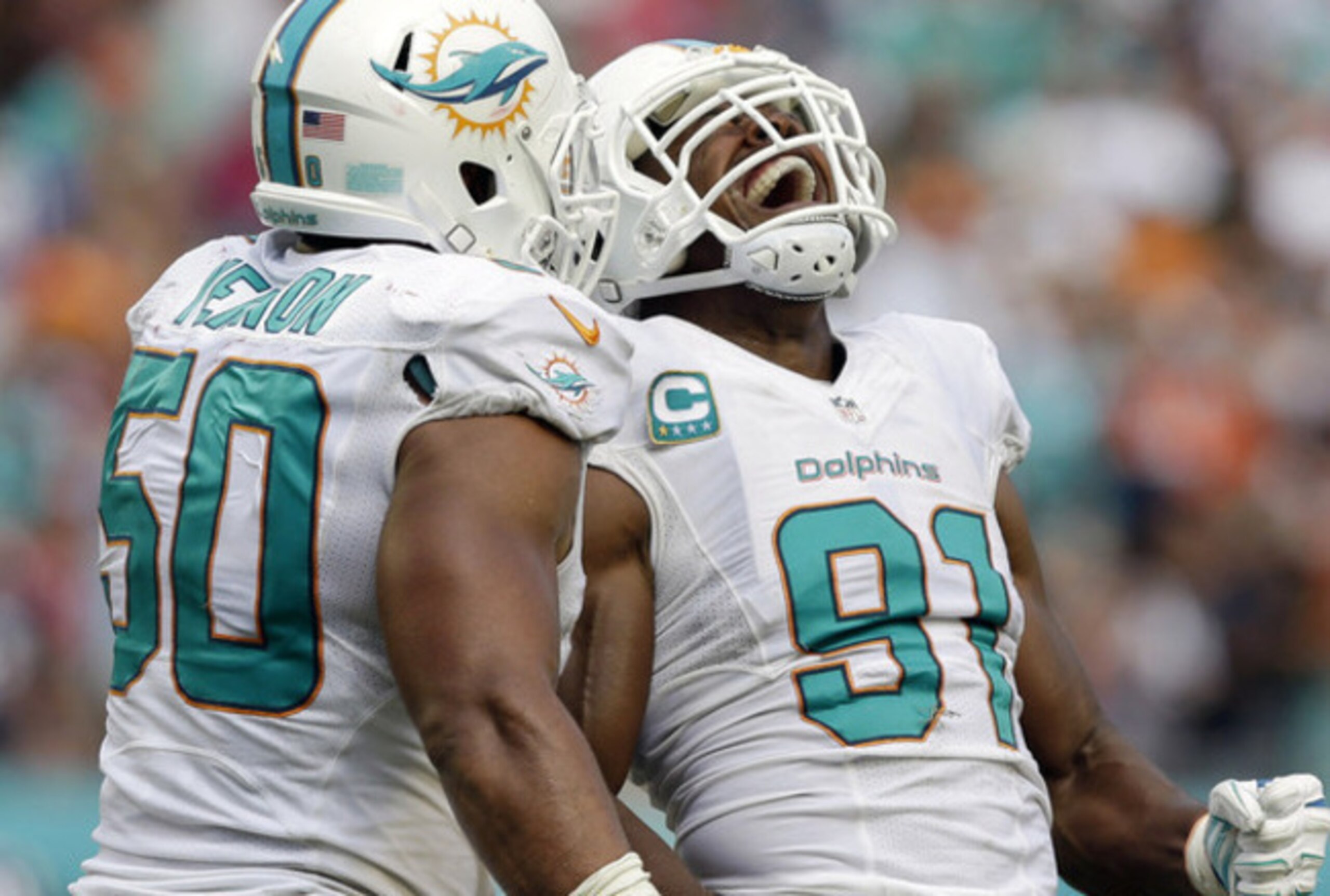 Olivier Vernon (50, left) and Cameron Wake (91, right) will pinch the pocket off the edges of the Dolphins defensive line. Olivier Vernon (50, left) and Cameron Wake (91, right) will pinch the pocket off the edges of the Dolphins defensive line.