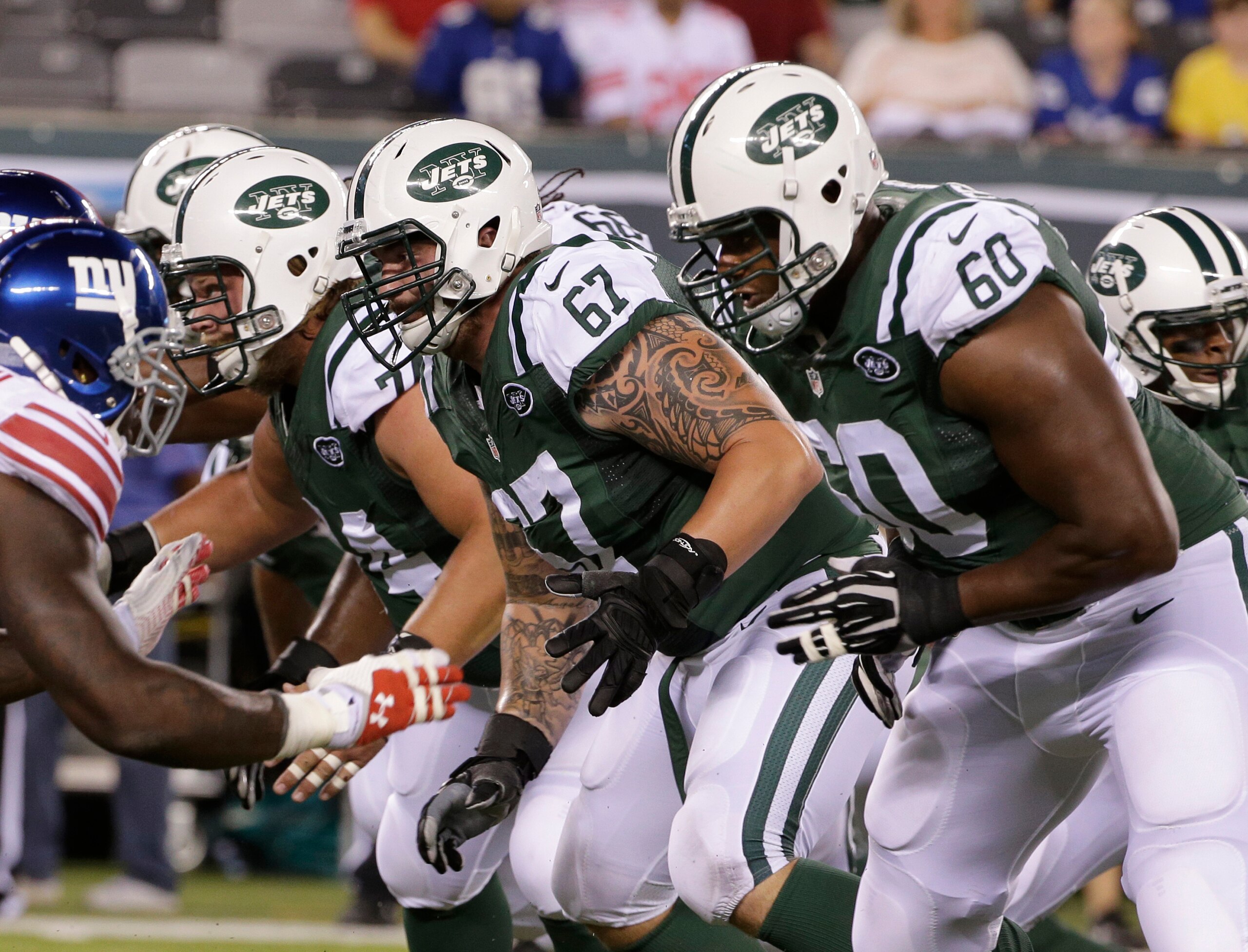 Nick Mangold (74, left) and D'Brickashaw Ferguson (60, right) will once again anchor the starting offensive line in 2015.