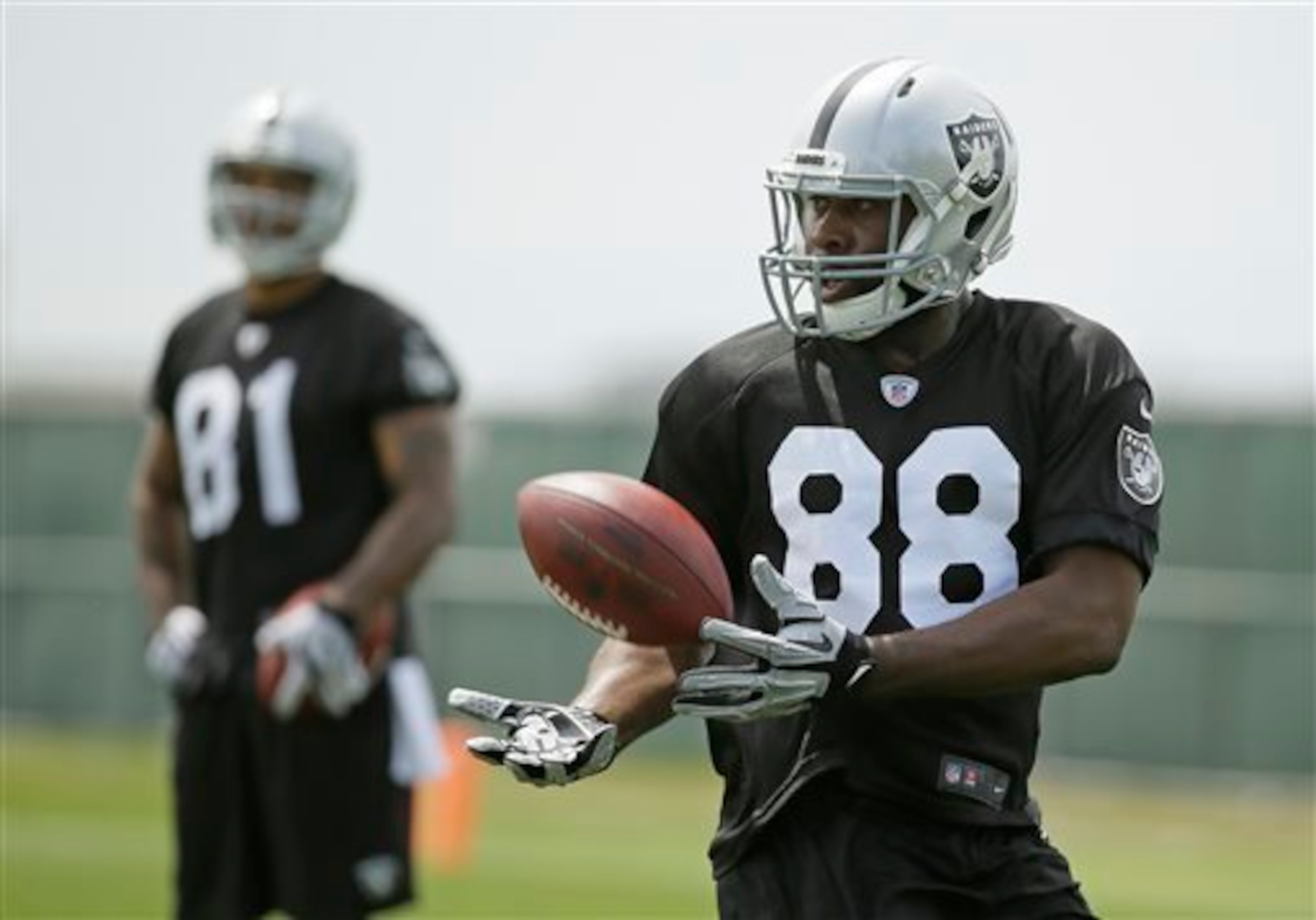 (left) Mychal Rivera (right) Clive Walford