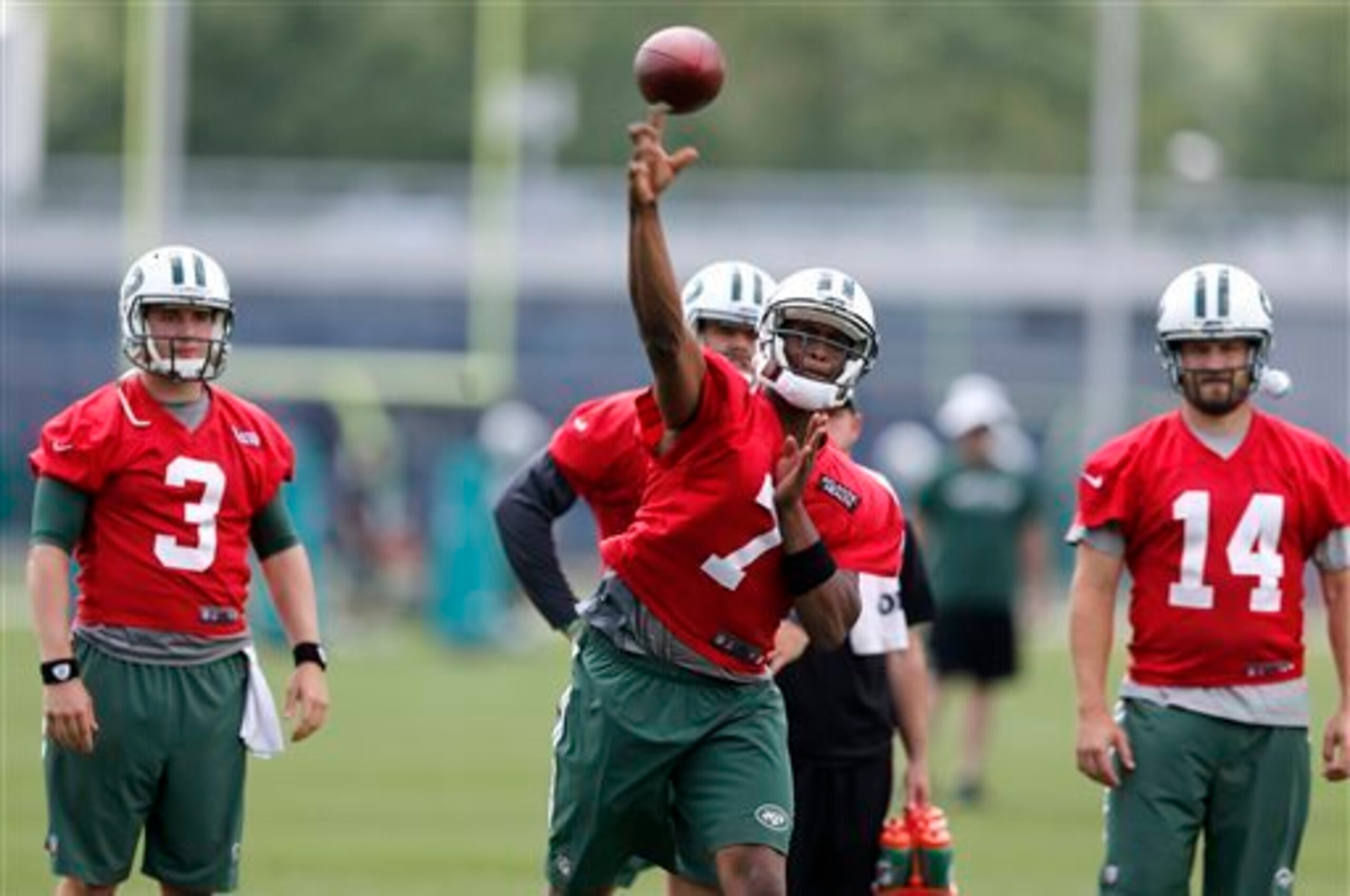 Geno Smith (7, middle) and Ryan Fitzpatrick (14, right) will be battling it out for the starting quarterback job...kind of.